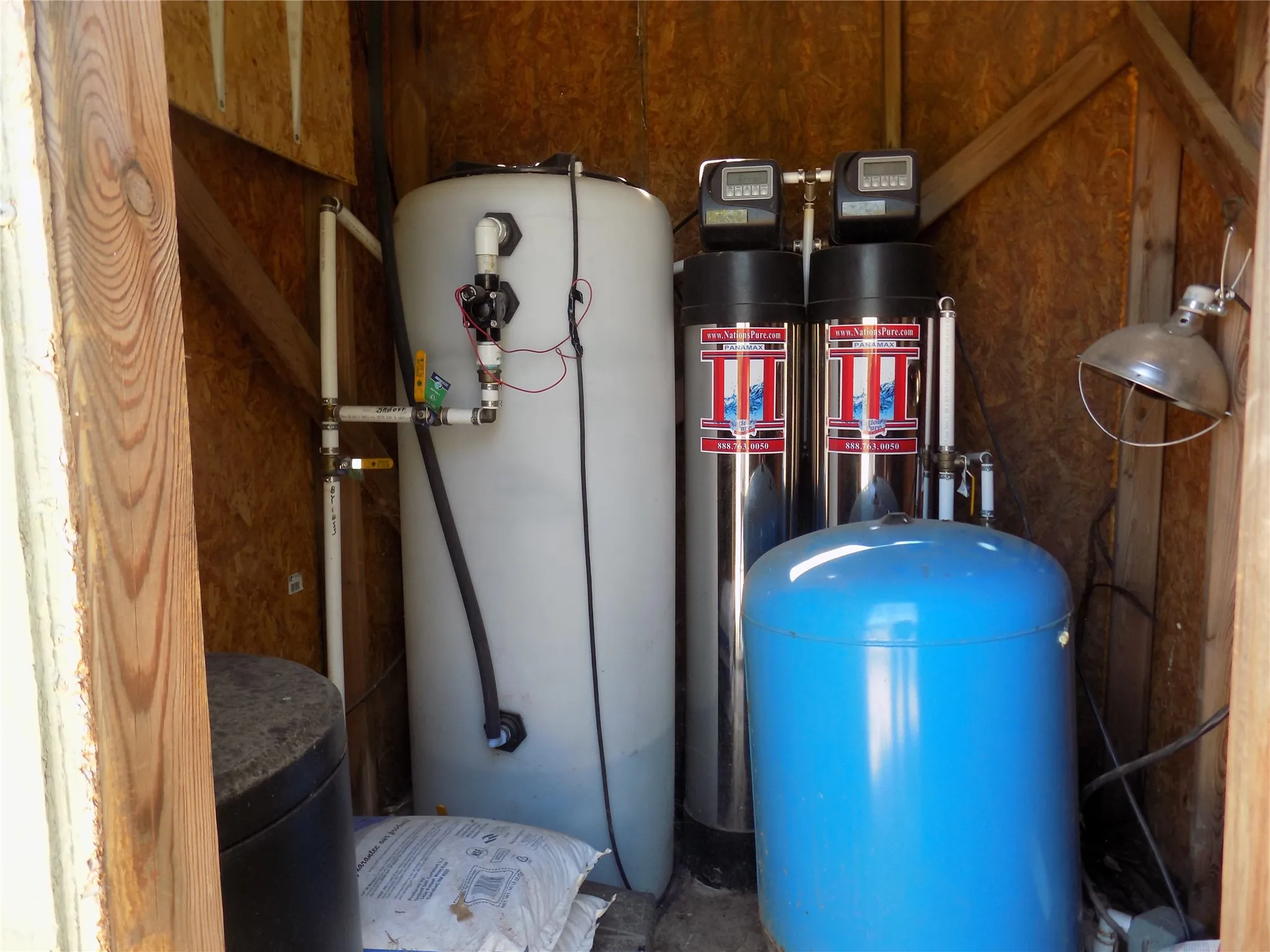 Well house has a special, enclosed water purifier softener system.