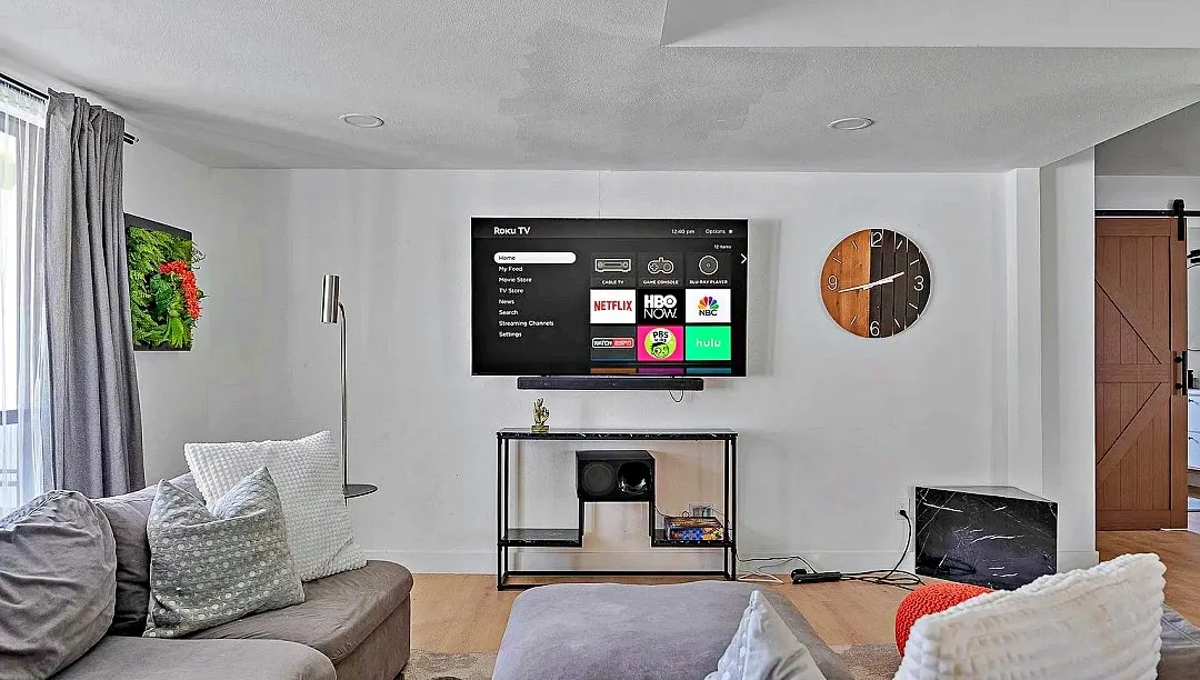 Open concept living area featuring light wood-finish flooring