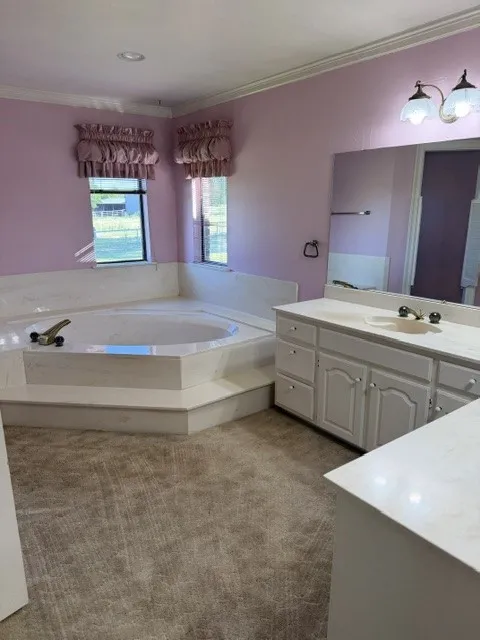 Her bathroom in the primary room