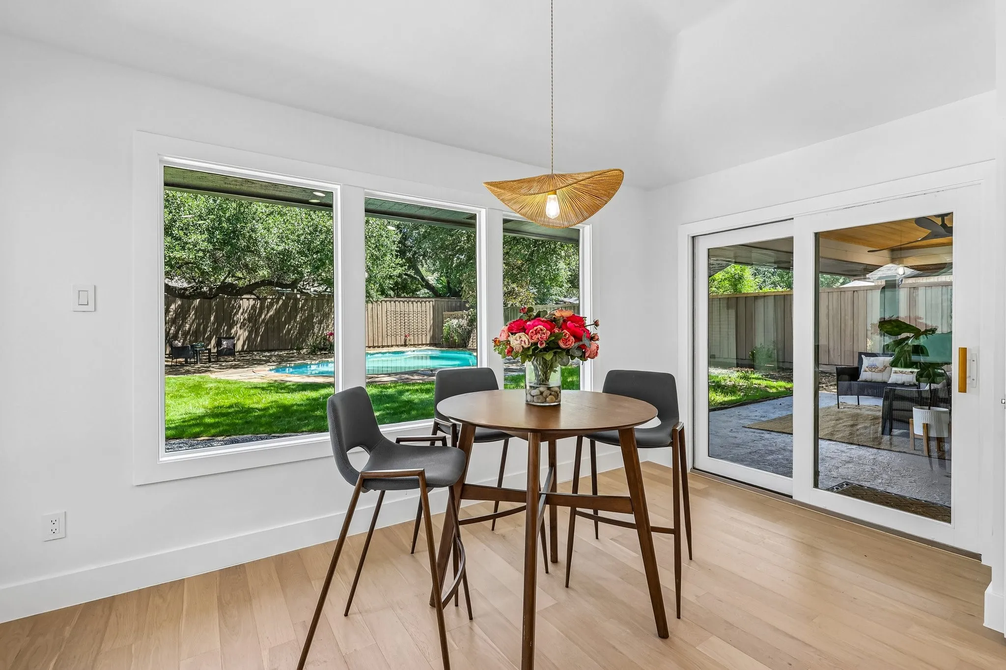 Interior dining area with light wood-finish flooring