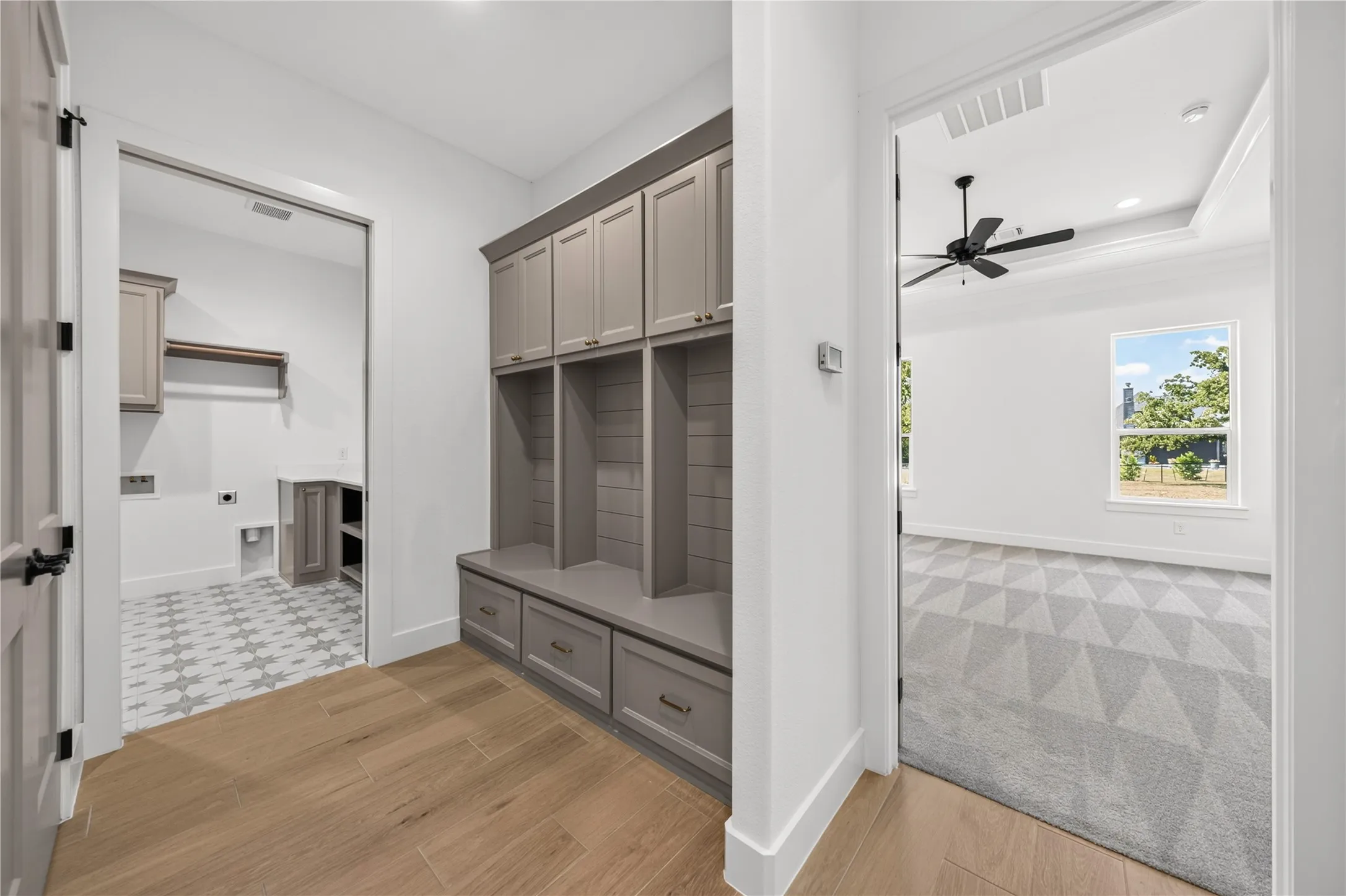 Built-in storage solutions featuring shaker-style cabinetry