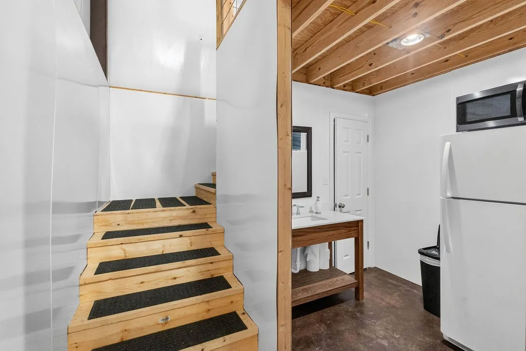 Half-bath under that stairs to the loft.