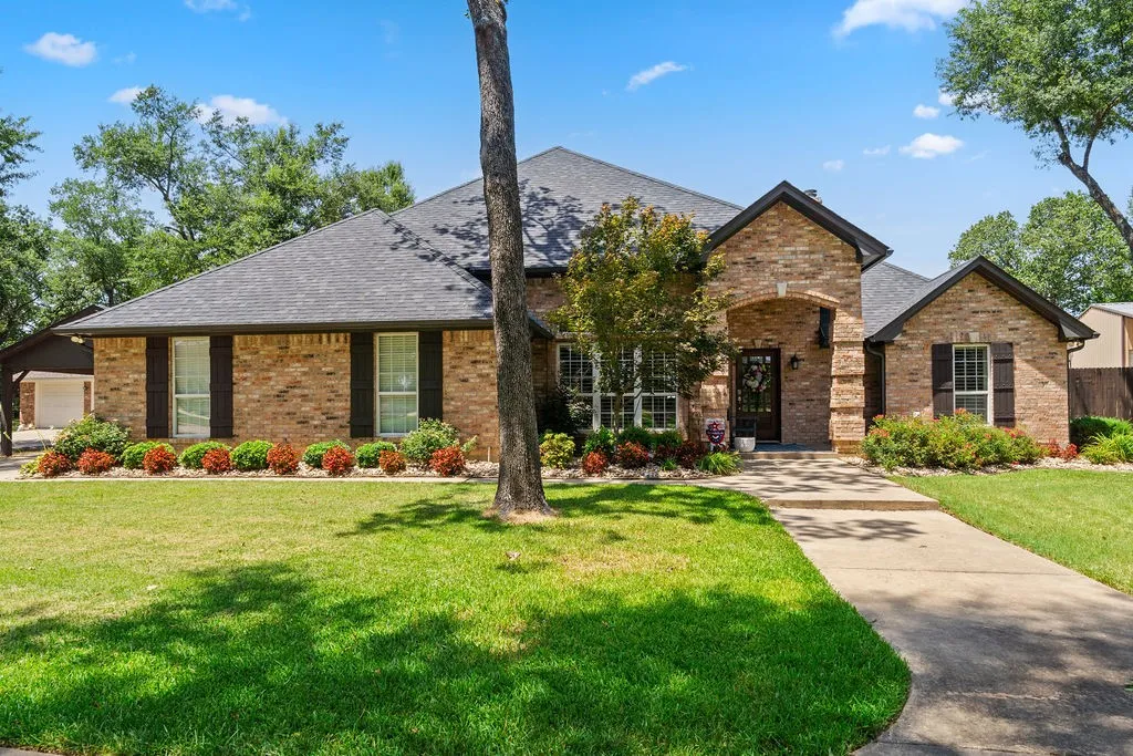 Gorgeous landscaping and yard has underground sprinkler system