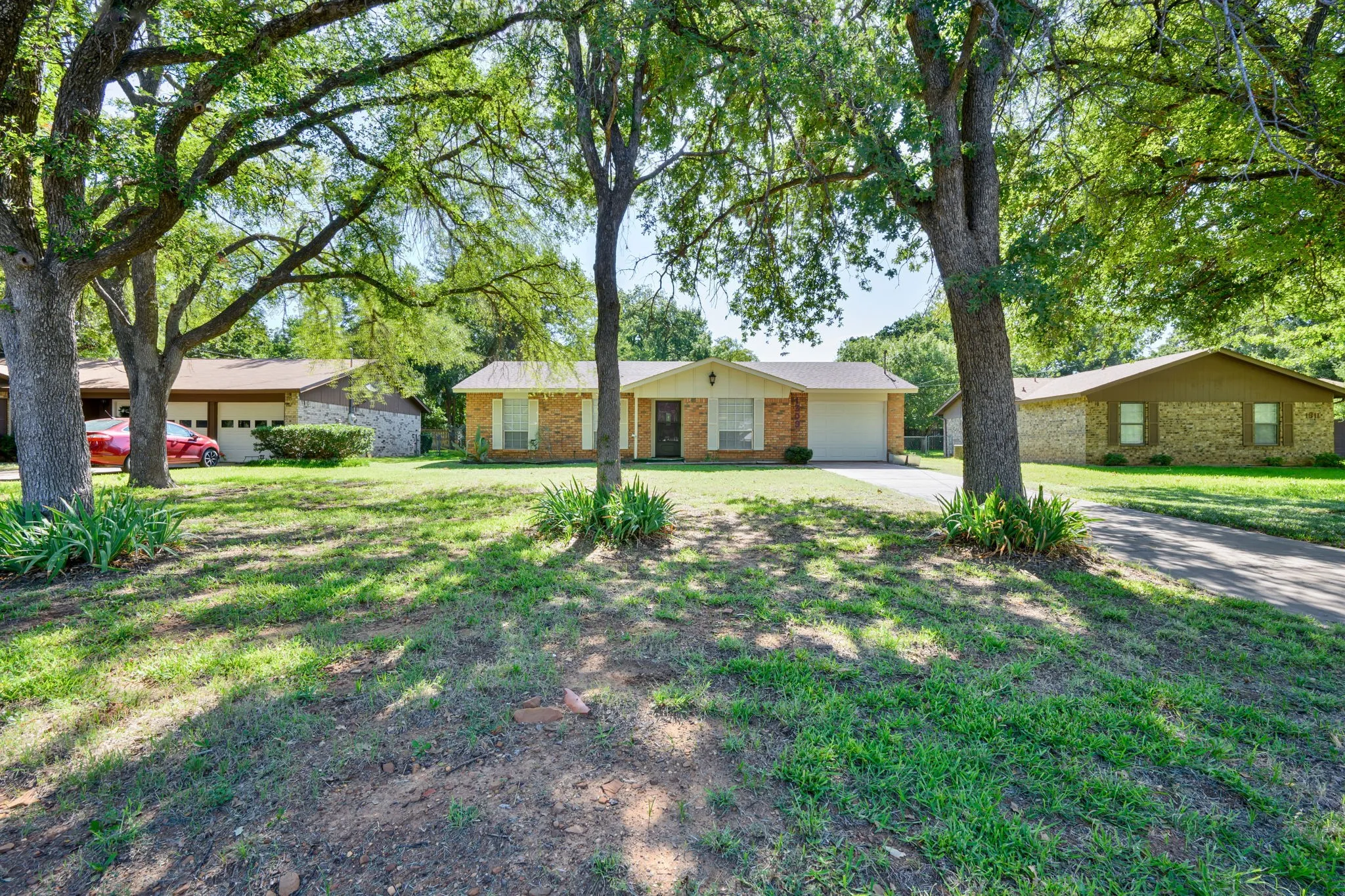 Few trees in front of property