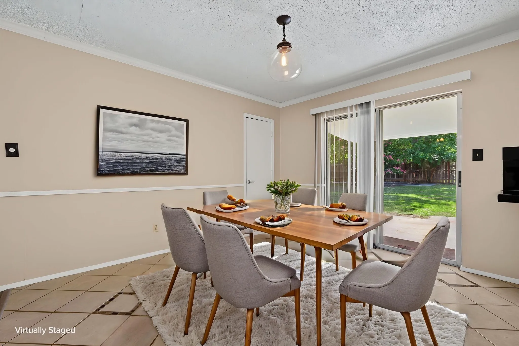 Virtually staged in-kitchen dining area