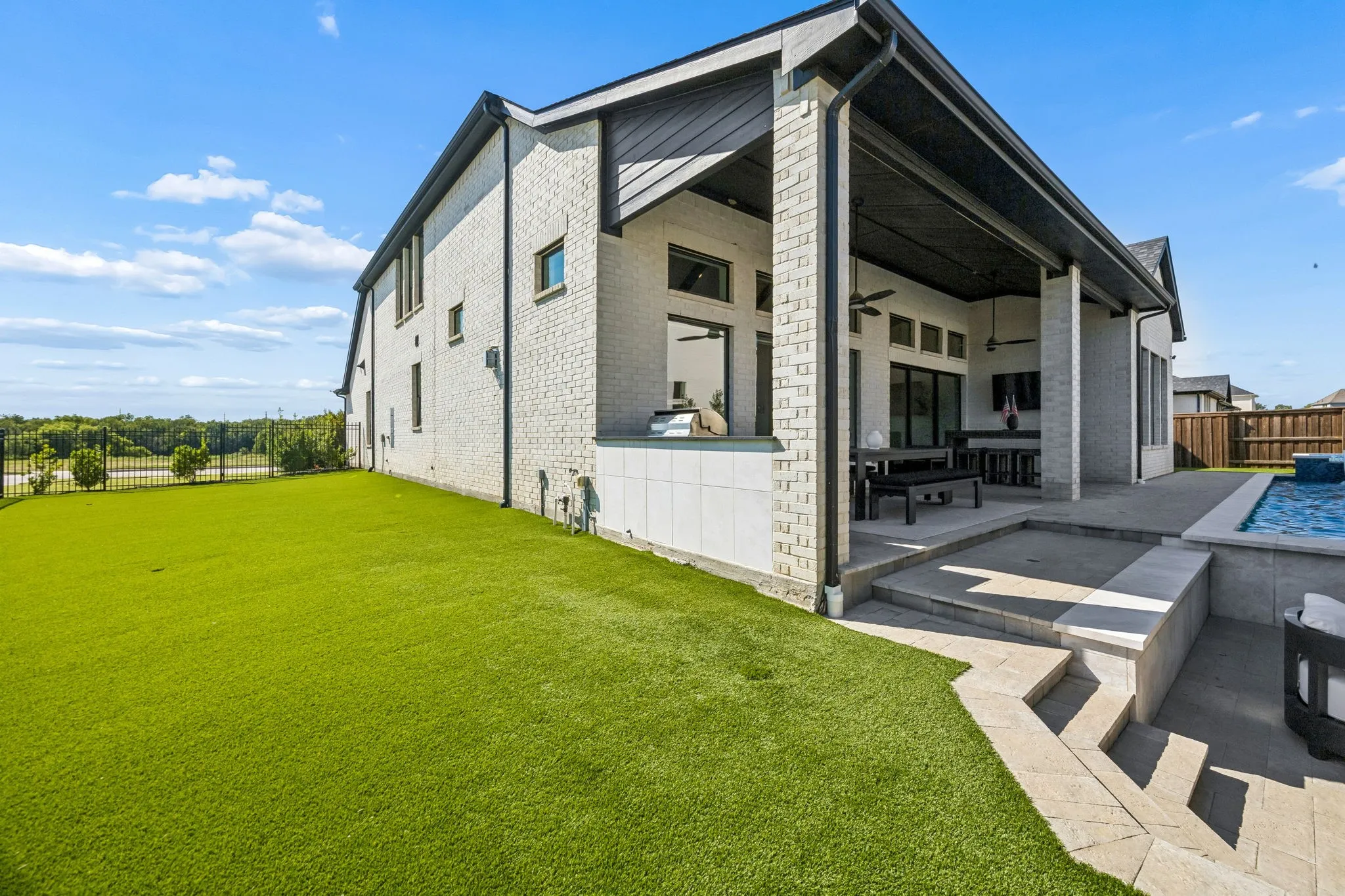Huge side yard with astro turf