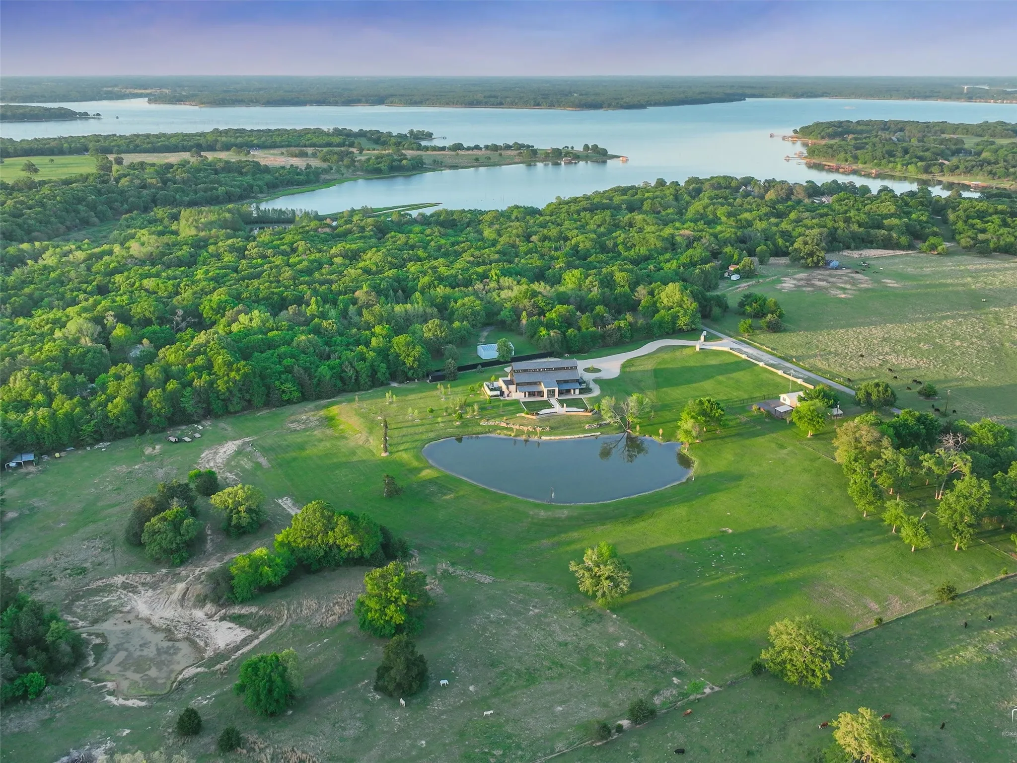 Multiple unique residences call the Listing Agent for all the details, including cabin, garage apartment, and two custom homes offering flexible living or guest options.
