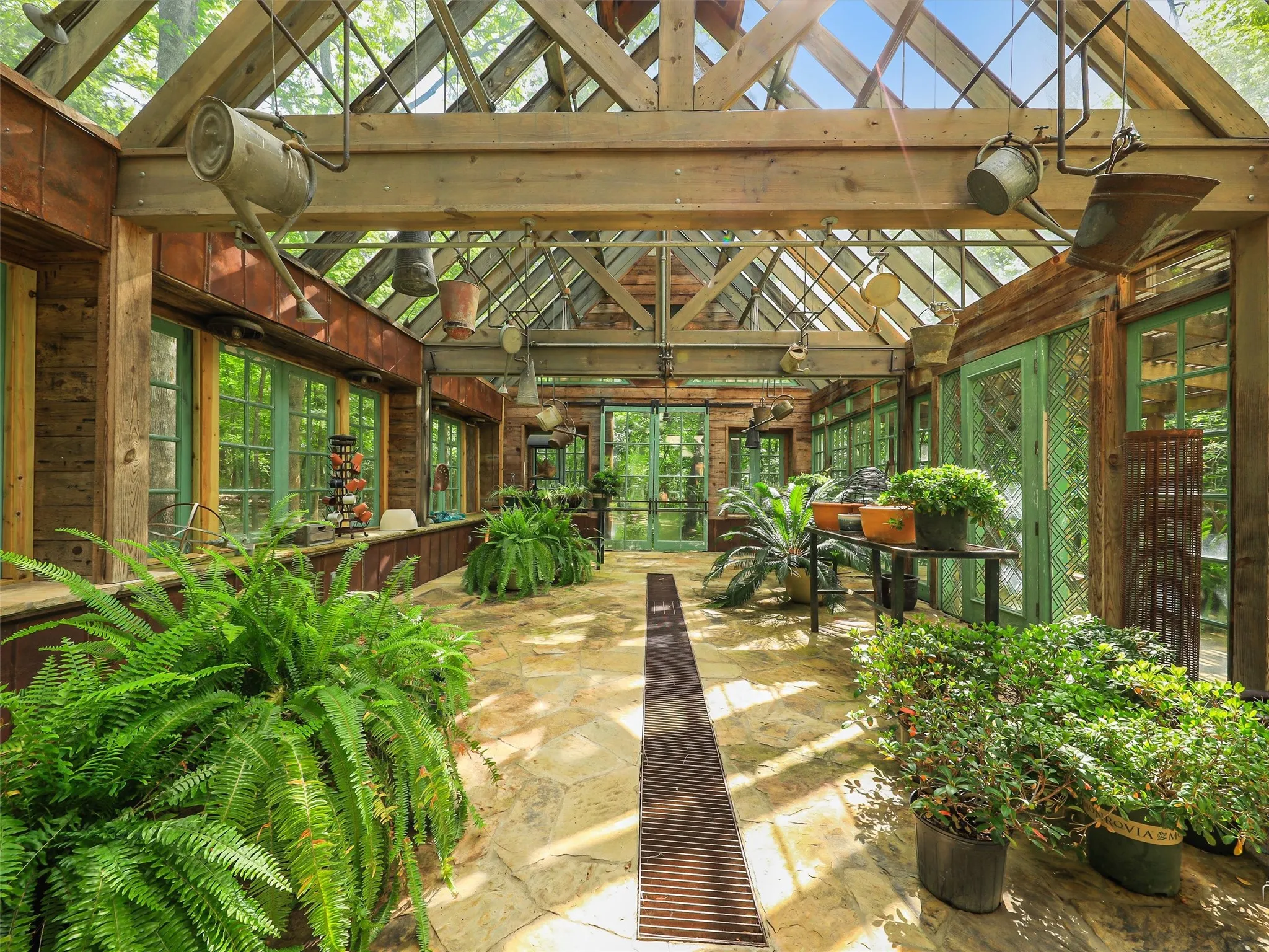 Greenhouse: Reclaimed-material greenhouse.
