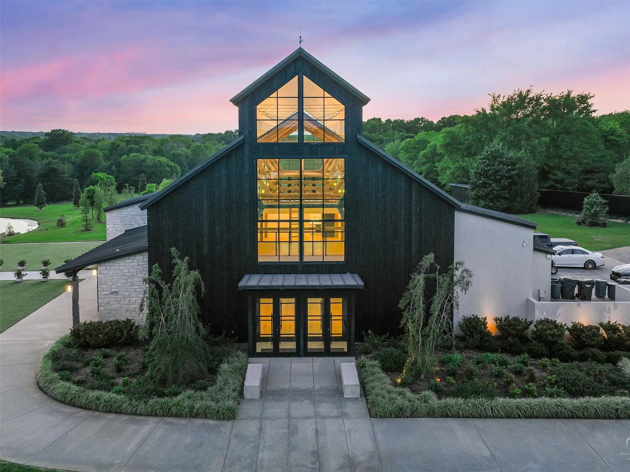 Signature Aurora venue featuring 1853 oak frame, tall ceilings, modern finishes, and expansive windows for striking event settings.