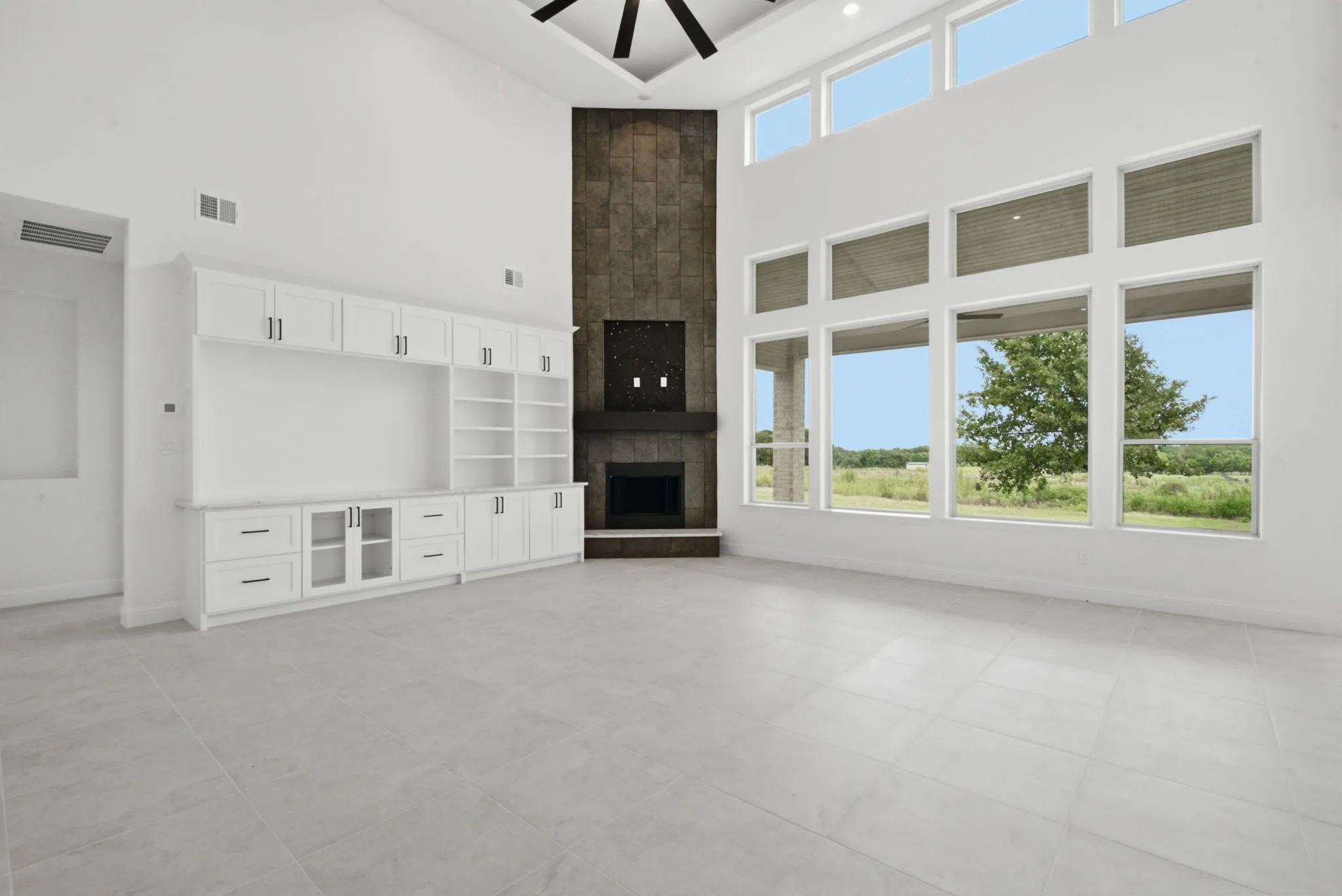 Enjoy this beautiful fireplace in your living, dining and kitchen areas!