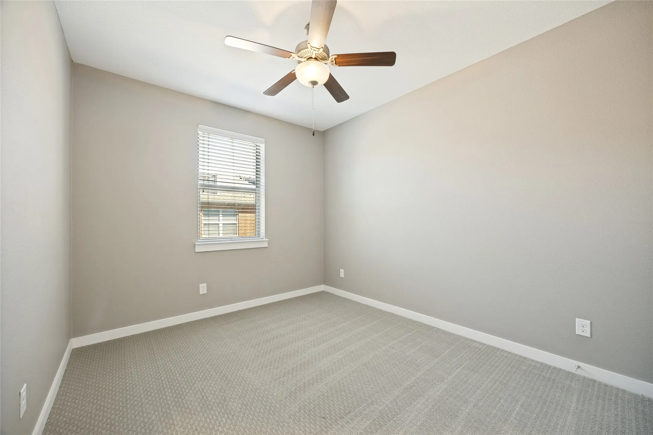 Secondary bedrooms have new textured carpet, ceiling fans, and east facing for the fresh morning sun to start the day.