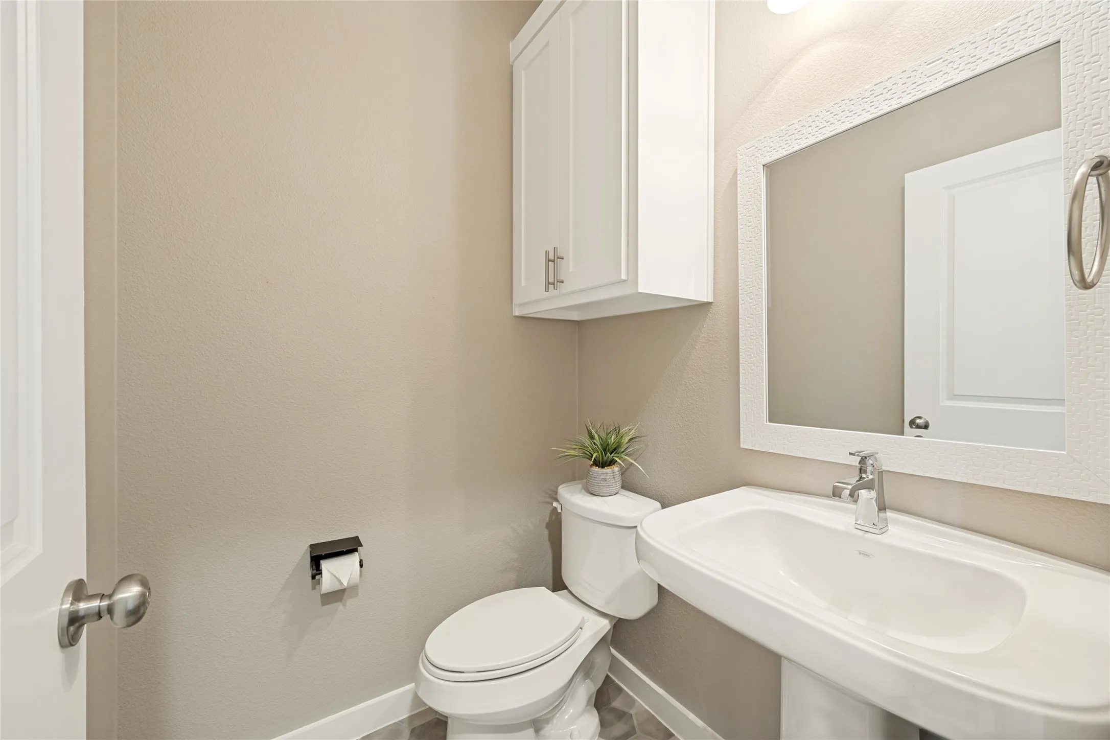 Downstairs half bathroom for guests, to keep your bathroom privately used upstairs.
