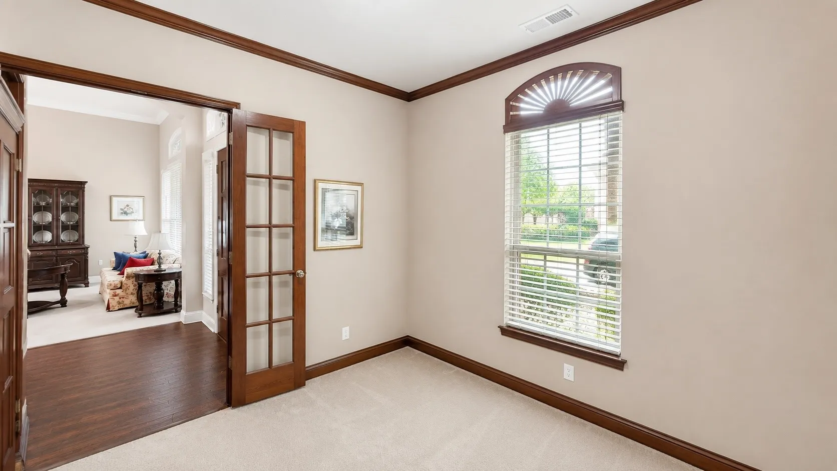 Office featuring neutral wall tones and carpeted flooring