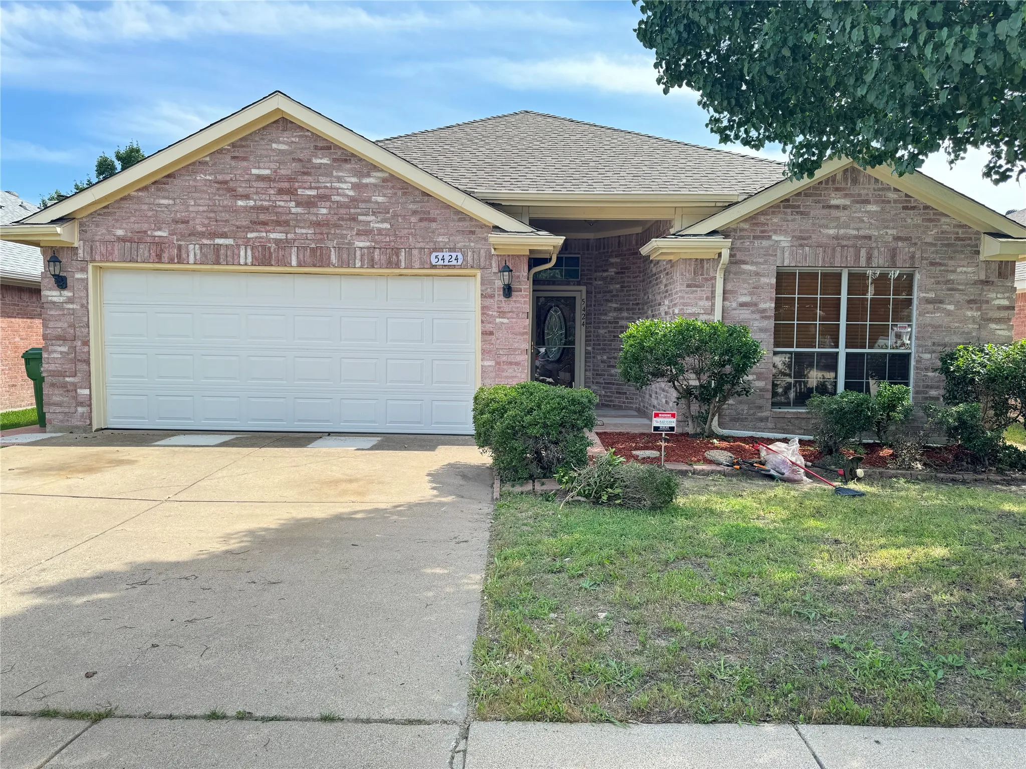 View of front of home featuring a garage