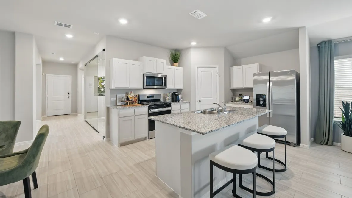 Kitchen- All Home and community information, including pricing, included features, terms, availability and amenities, are subject to change at any time without notice or obligation. All Drawings, pictures, photographs, video, square footages, floor plans, elevations, features, colors and sizes are approximate for illustration purposes only and will vary from the homes as built.