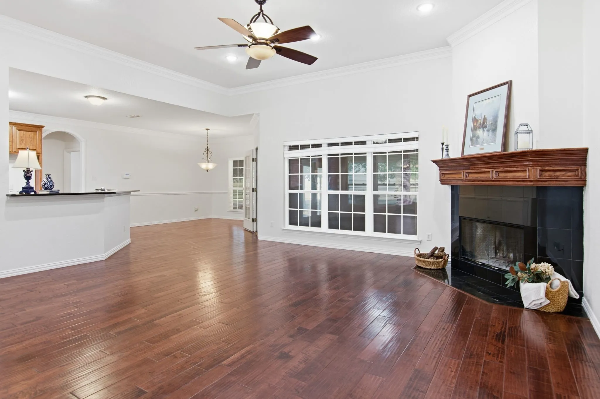 Family Room, wood floors flow throughout the living areas, formal dining and breakfast areas.