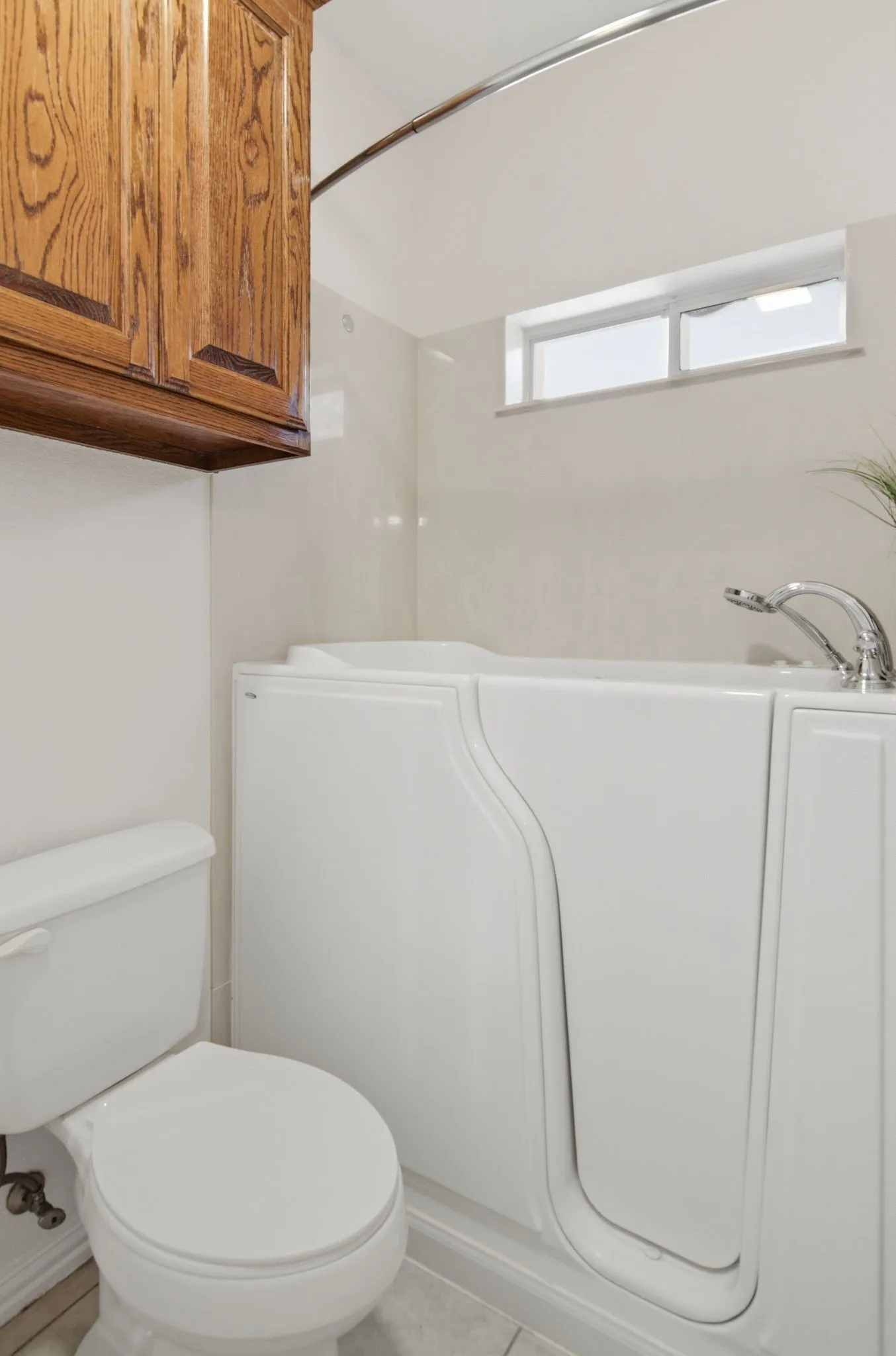 Jack & Jill bath has a handicap tub & shower!