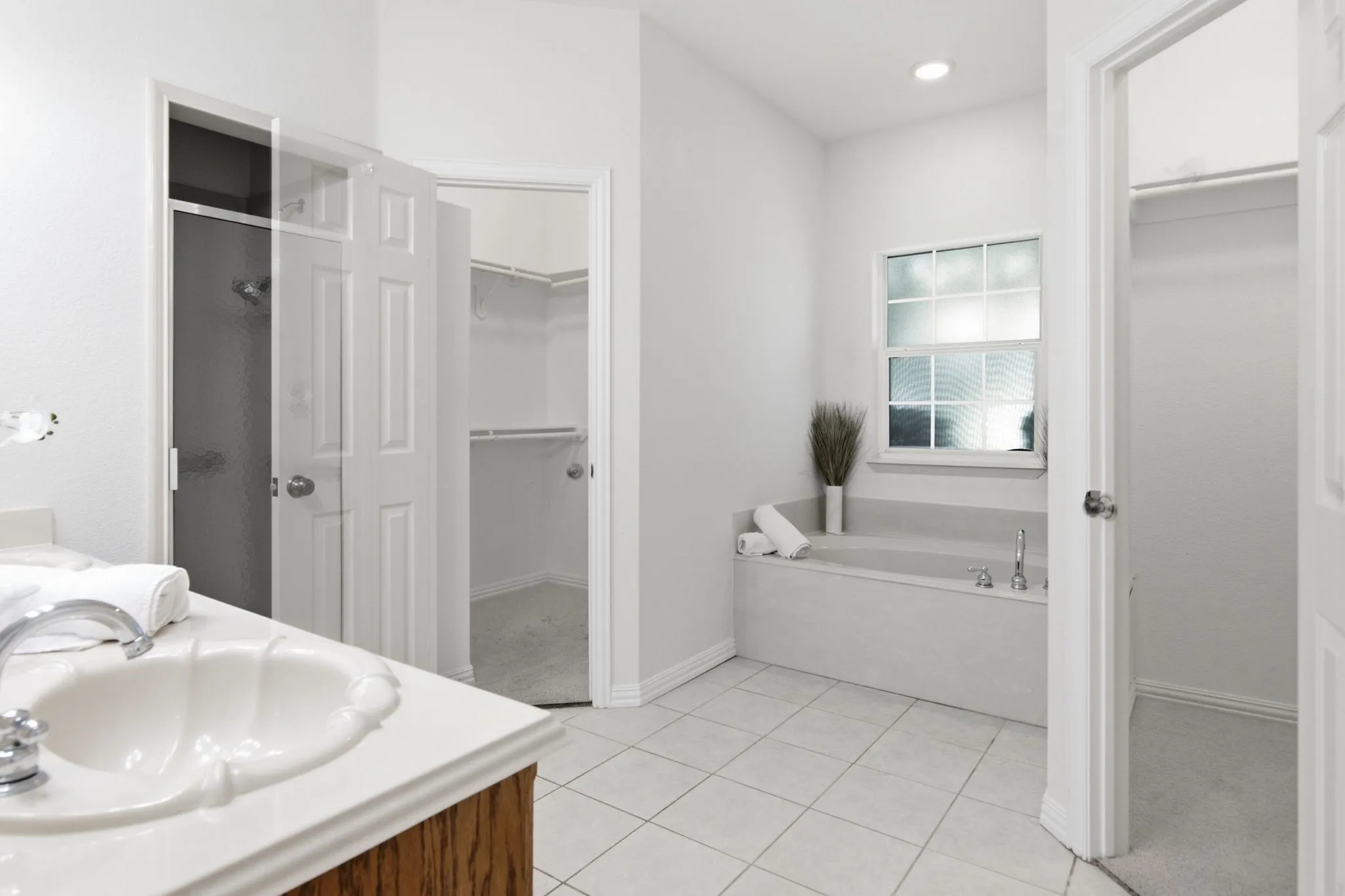 Primary Bath with two walk in closets, jetted tub, large shower!