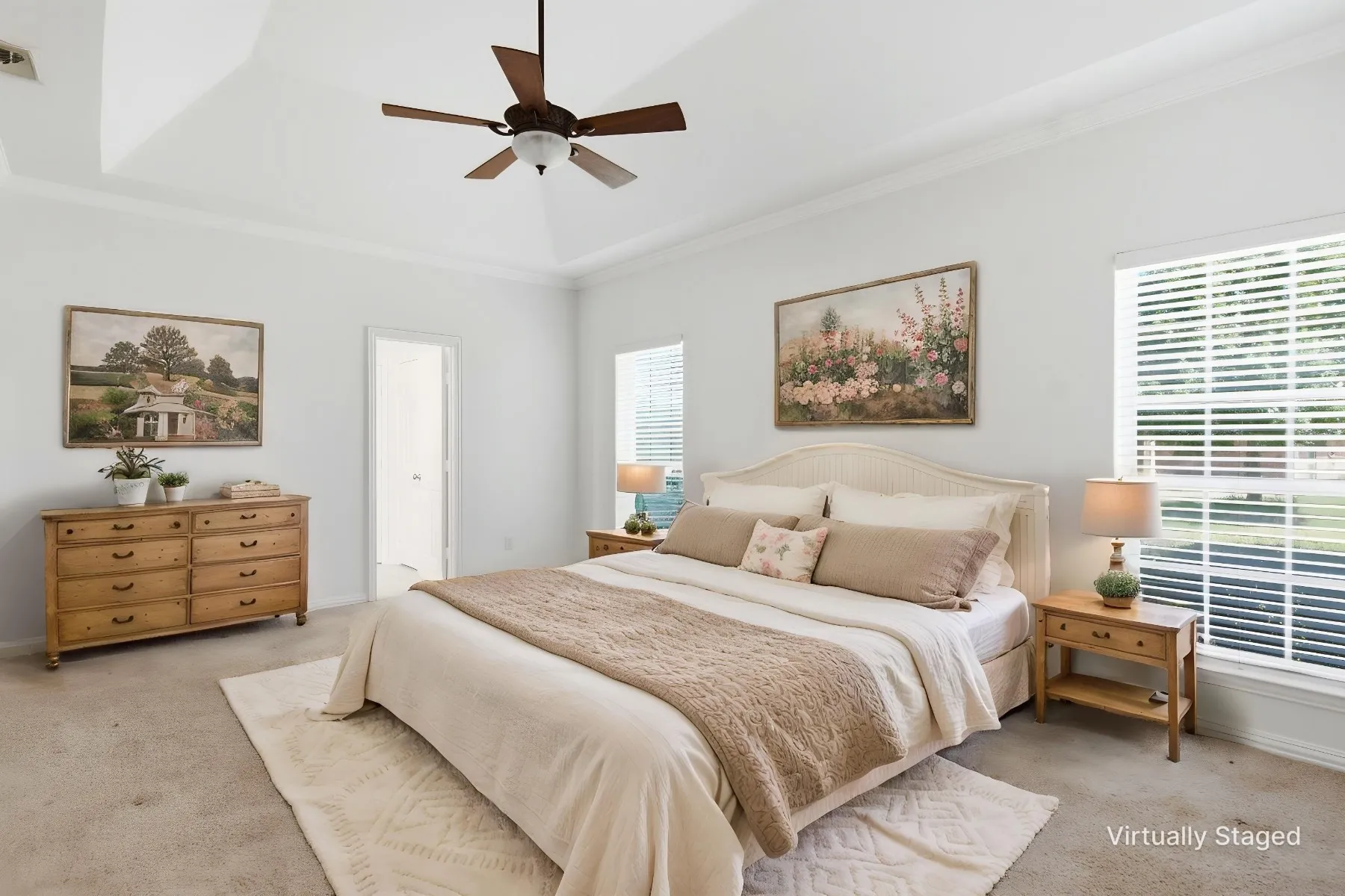 Large primary bedroom, tall ceilings, crown moldings, light & bright!