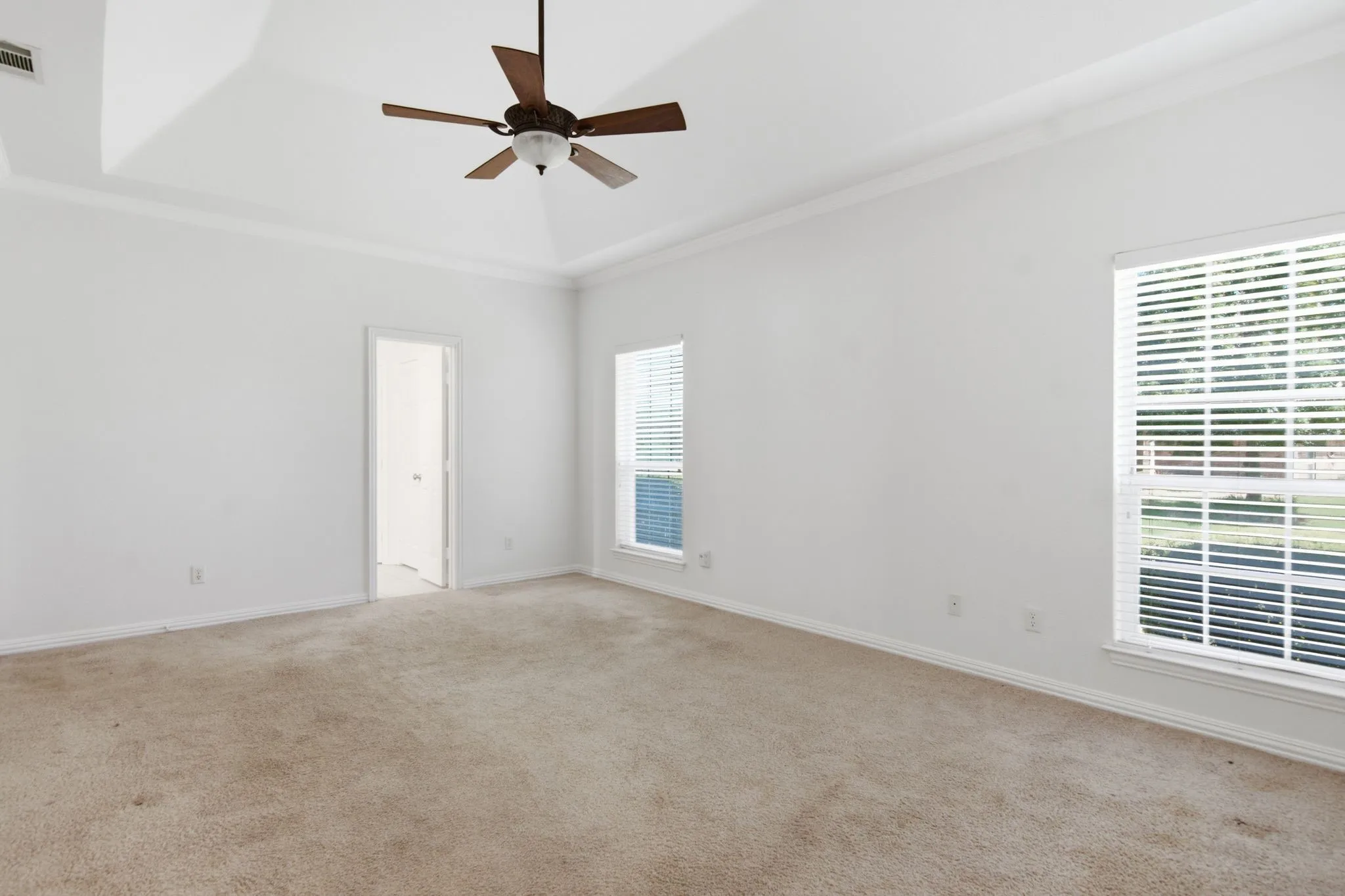 large Primary bedroom with tall ceilings, light & bright!
