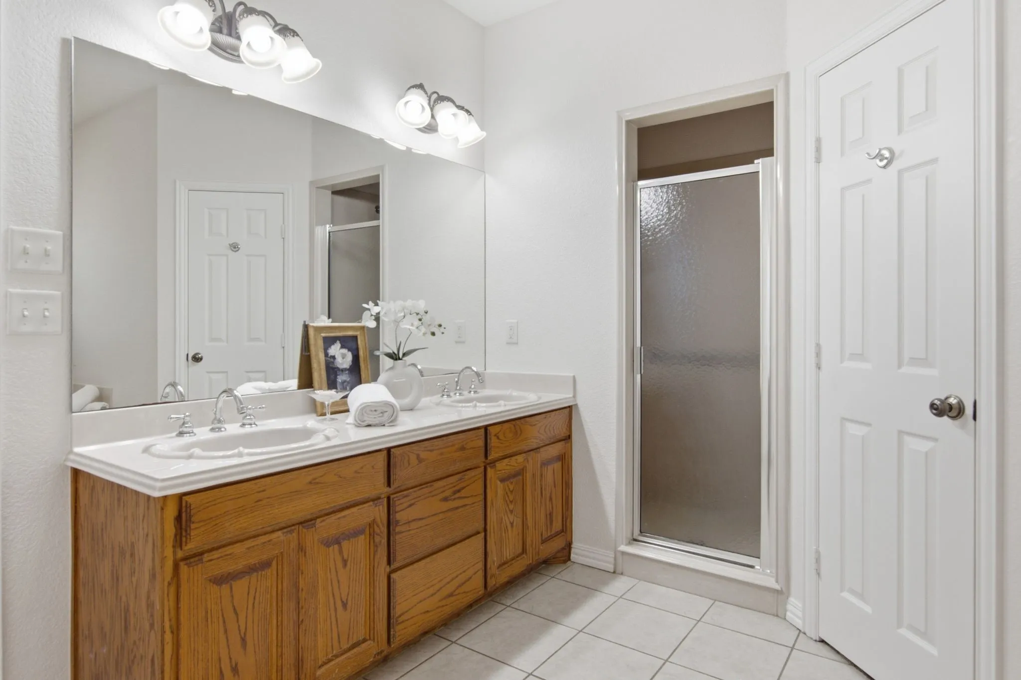 Primary bathroom with dual sinks, two walk in closets, large separate shower!