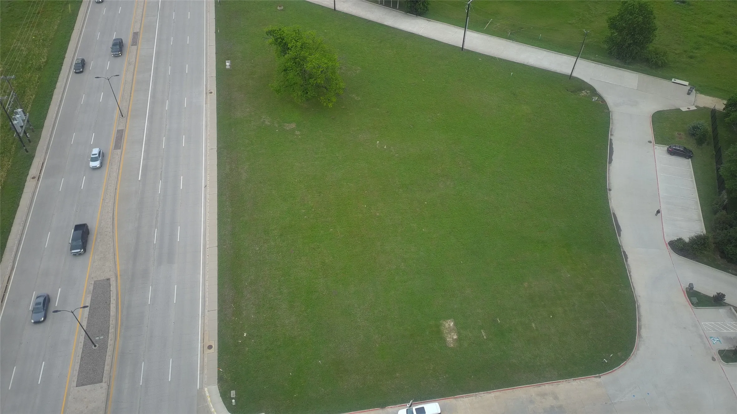 Expansive, level lot with manicured grass