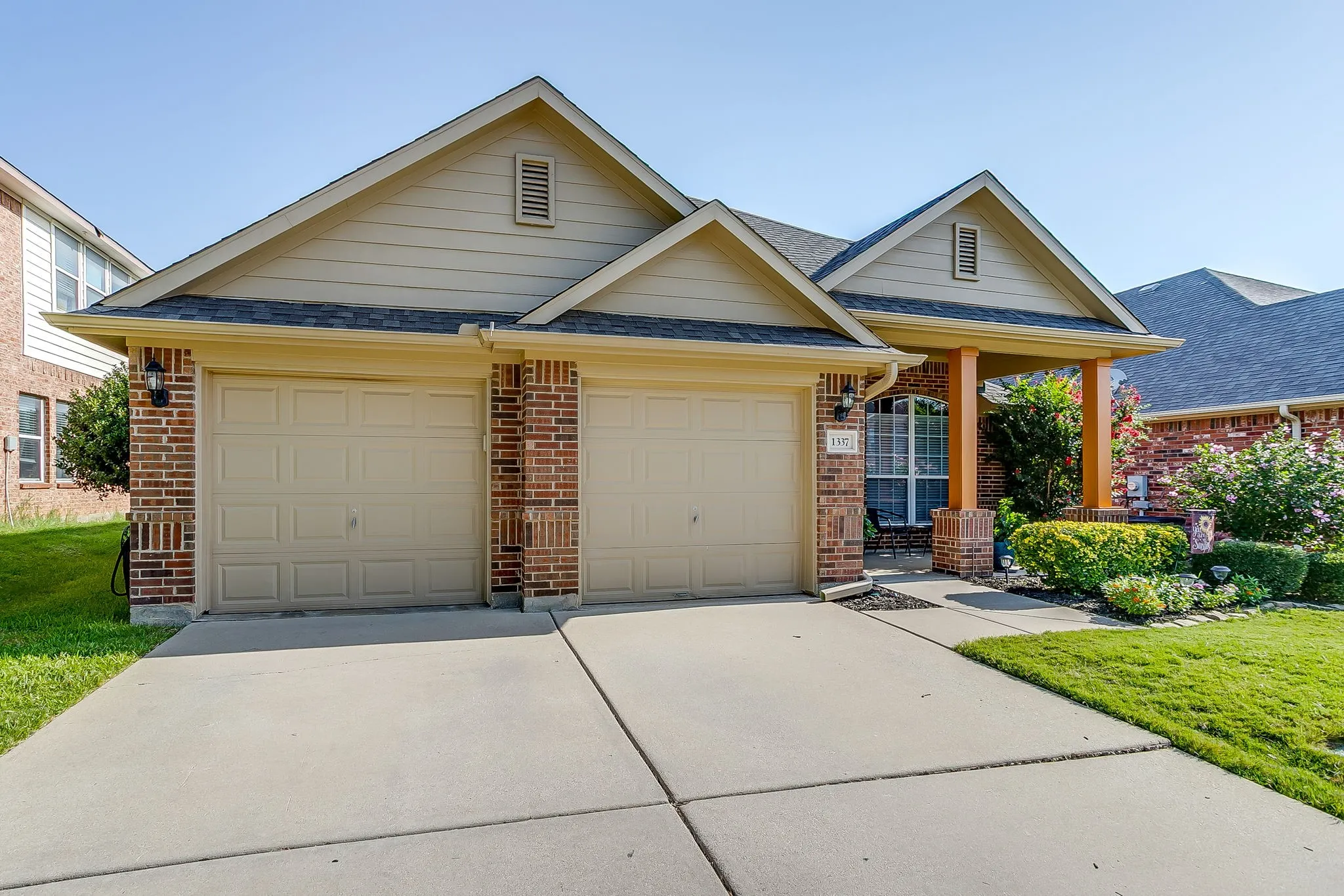 Fantastic curb appeal with a covered front porch.