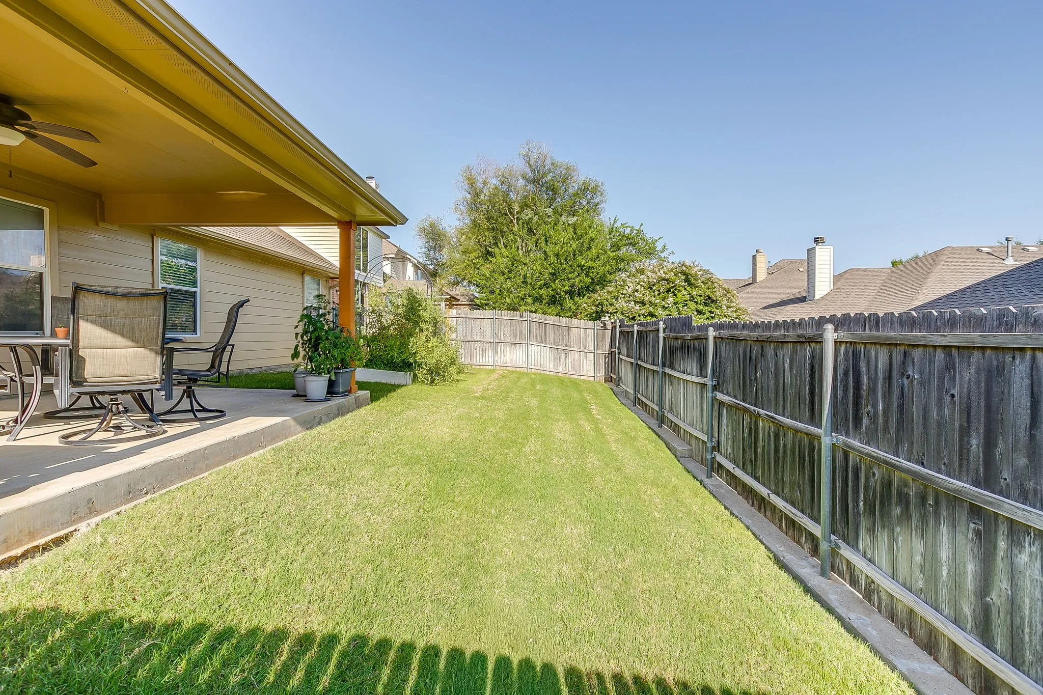 Fully fenced backyard.