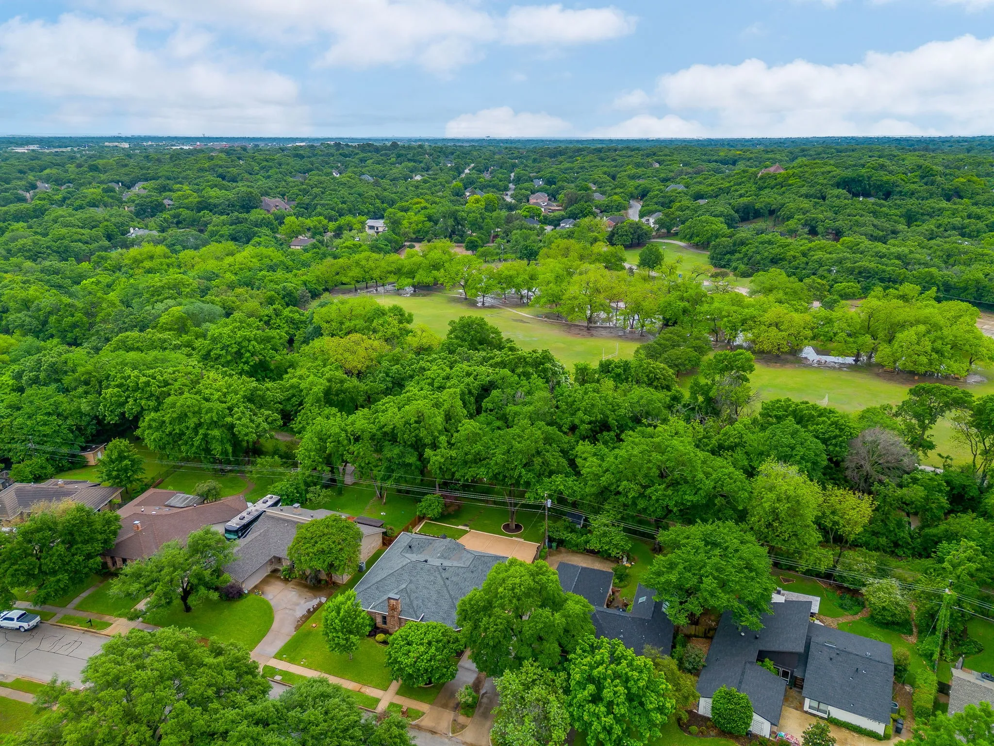 Backs to Greenbelt & Parr Park
Expansive treed landscape with residential properties bordering a manicured green space