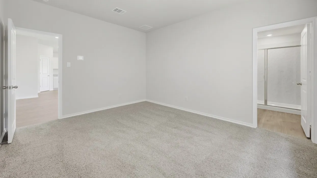 Neutral-toned room with plush carpeting