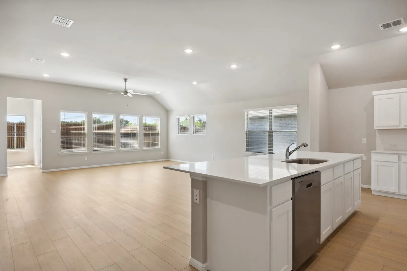 Kitchen in the Diamond home plan by Trophy Signature Homes – REPRESENTATIVE PHOTO