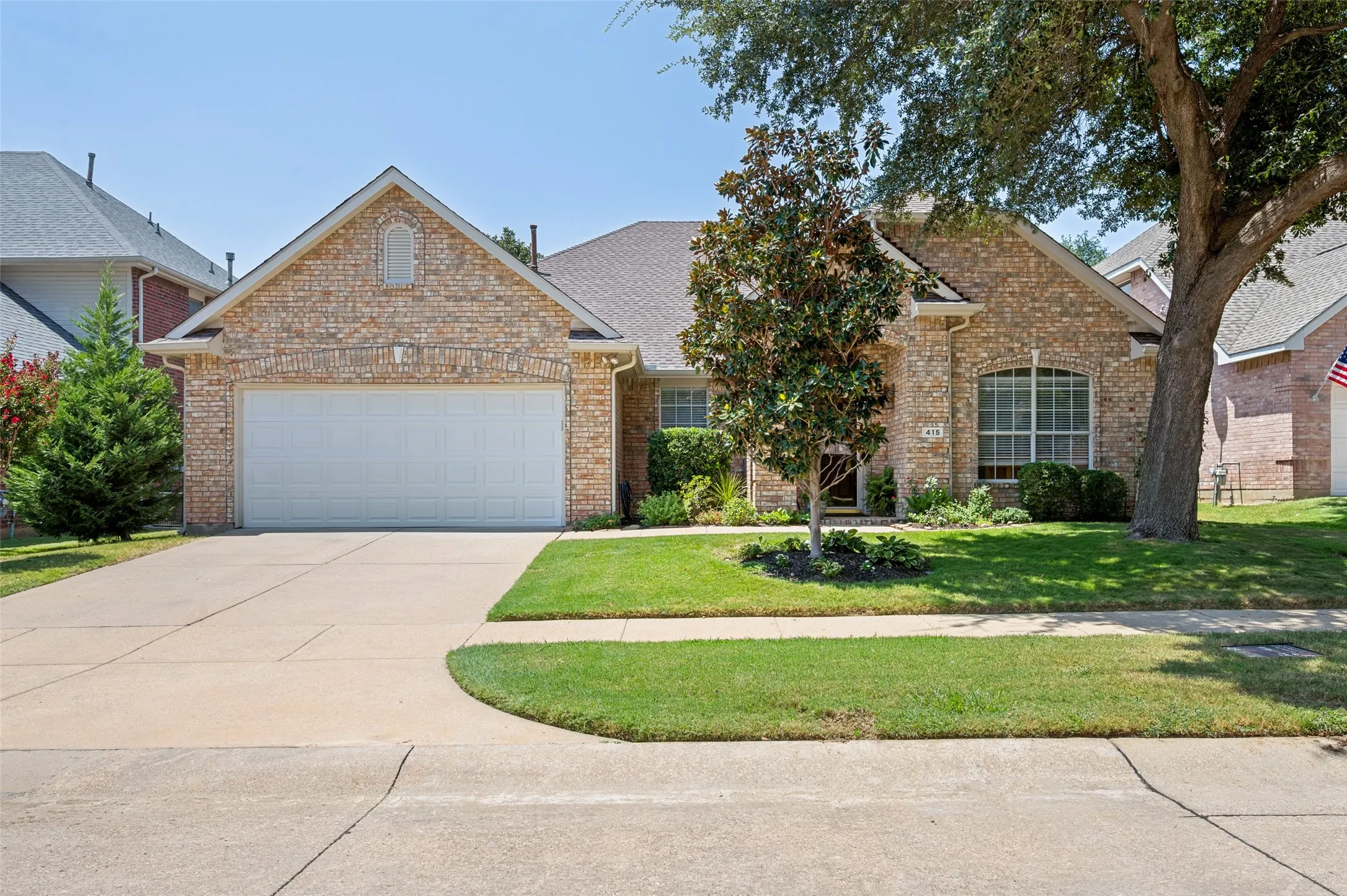 set on the edge of a cul de sac with new garage door