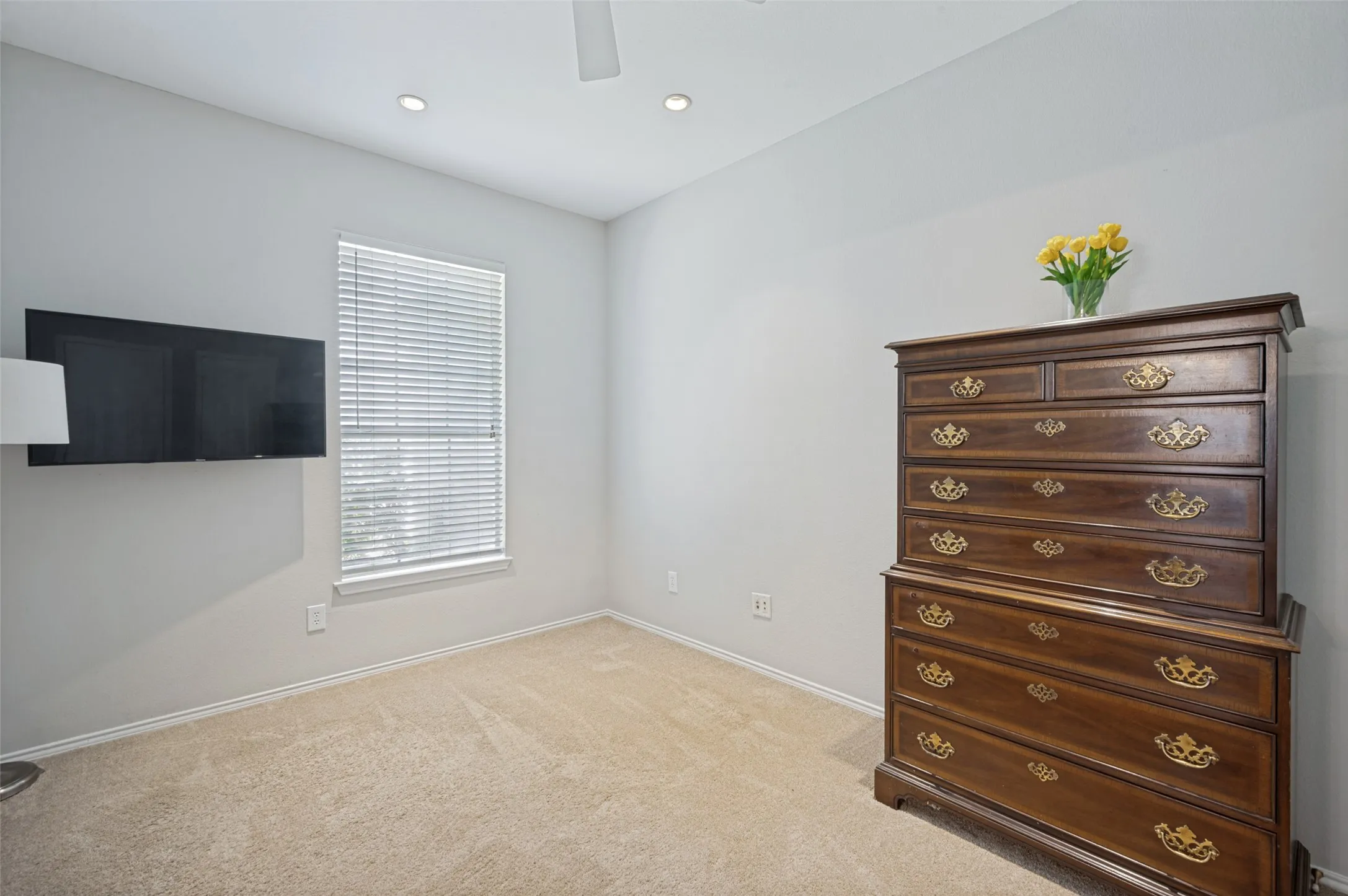 Secondary bedroom with en suite bath or can be used as an office at the front of the house