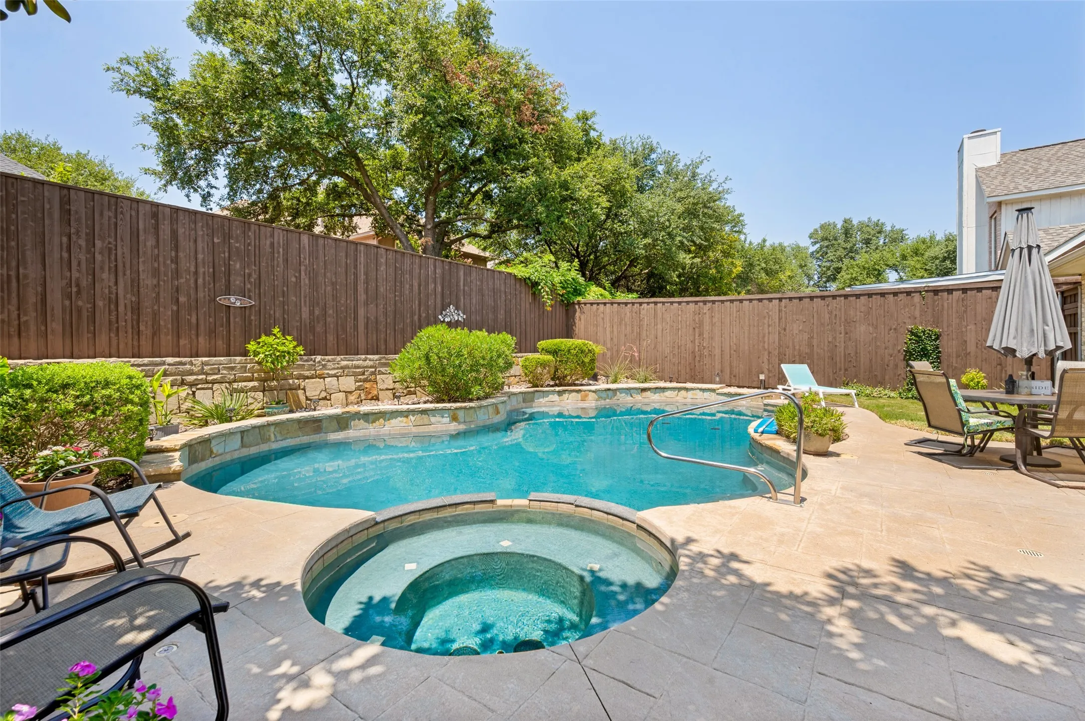 Nice size pool with hot tub