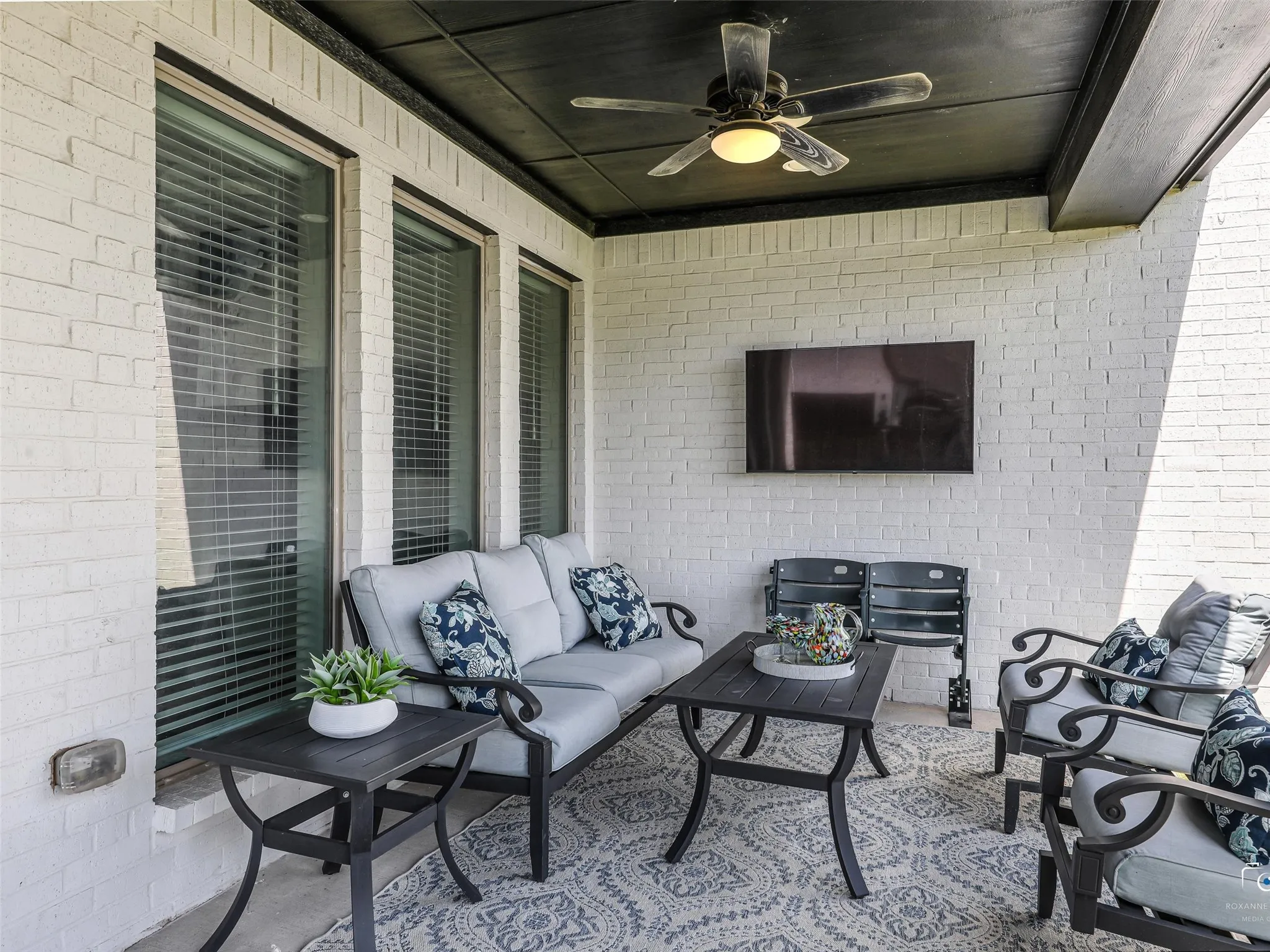 Covered Patio with mounted TV.