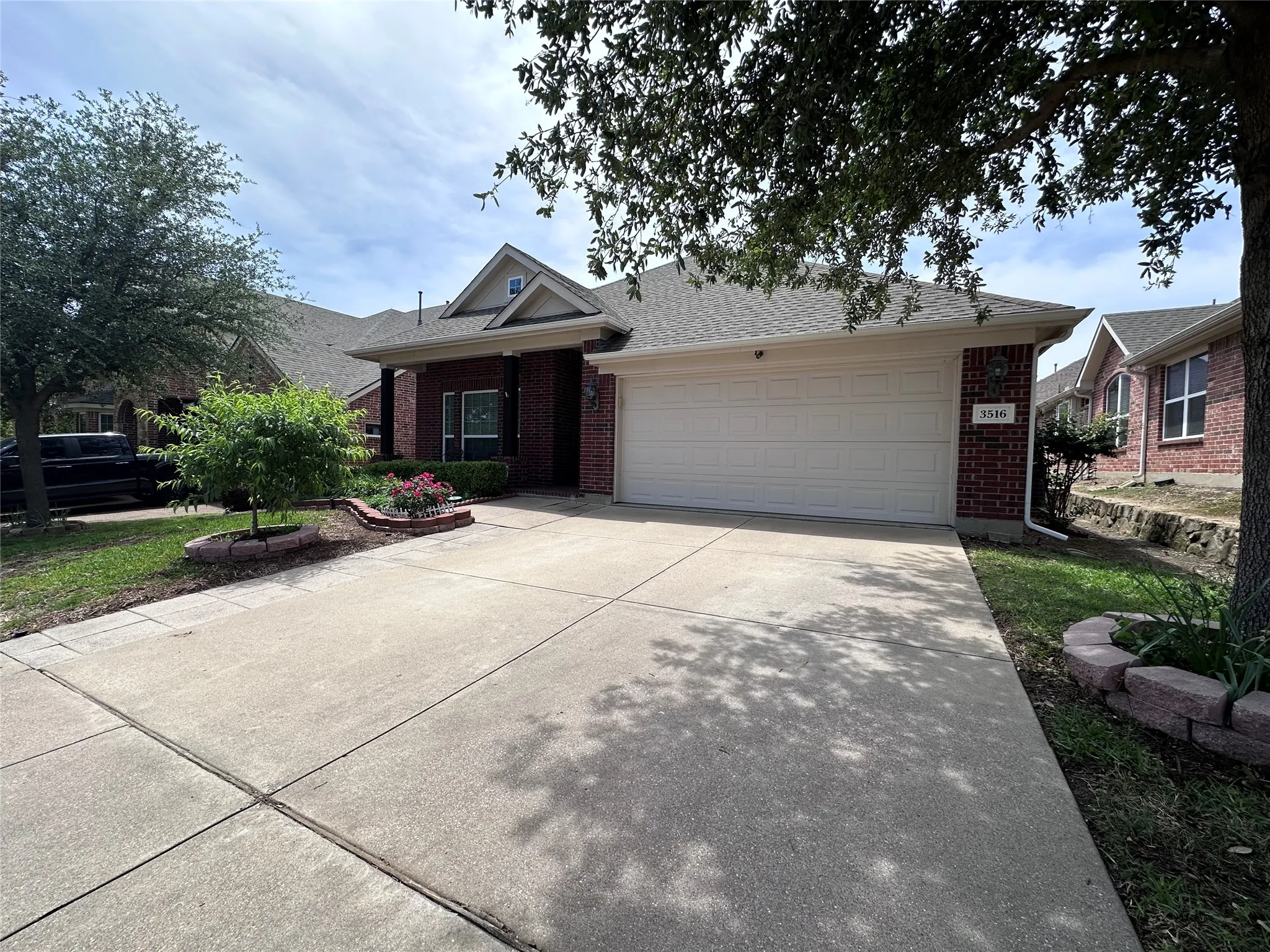 Brick exterior with a gabled roofline