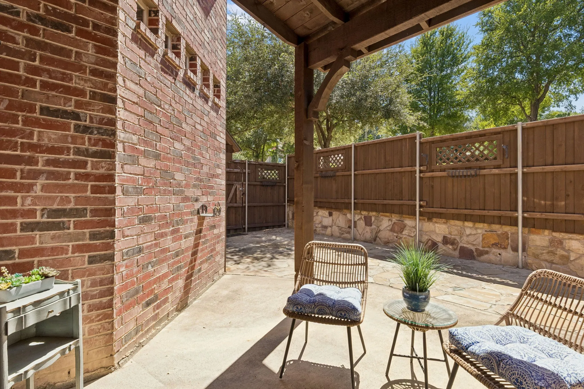 The current owner had great vision in creating a side courtyard. Shaded in the morning, is the perfect coffee and breakfast spot.