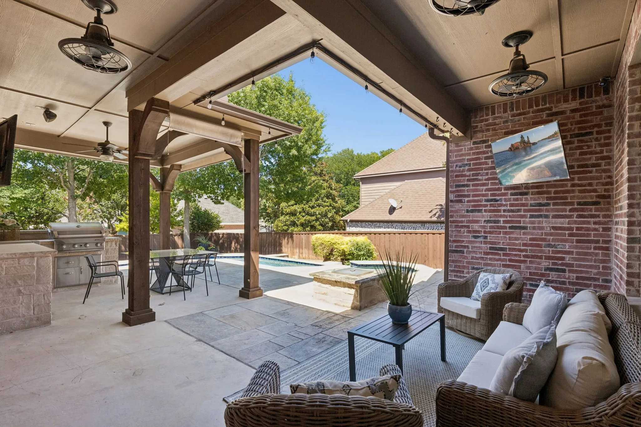 Our favorite part of this home is this backyard. Serene, beautiful, and shaded all afternoon.