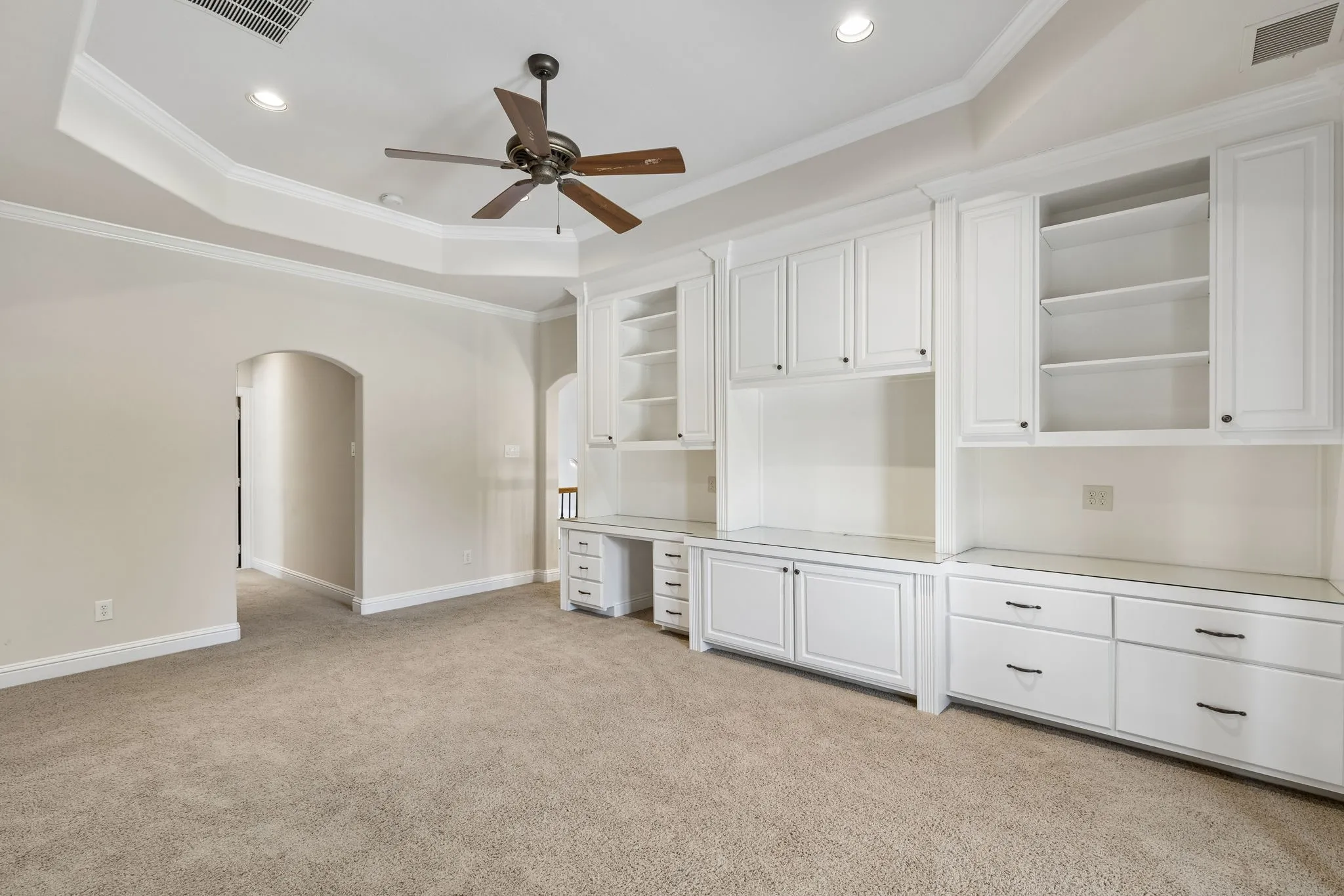 The wall of built-ins is great for kids or a second office.