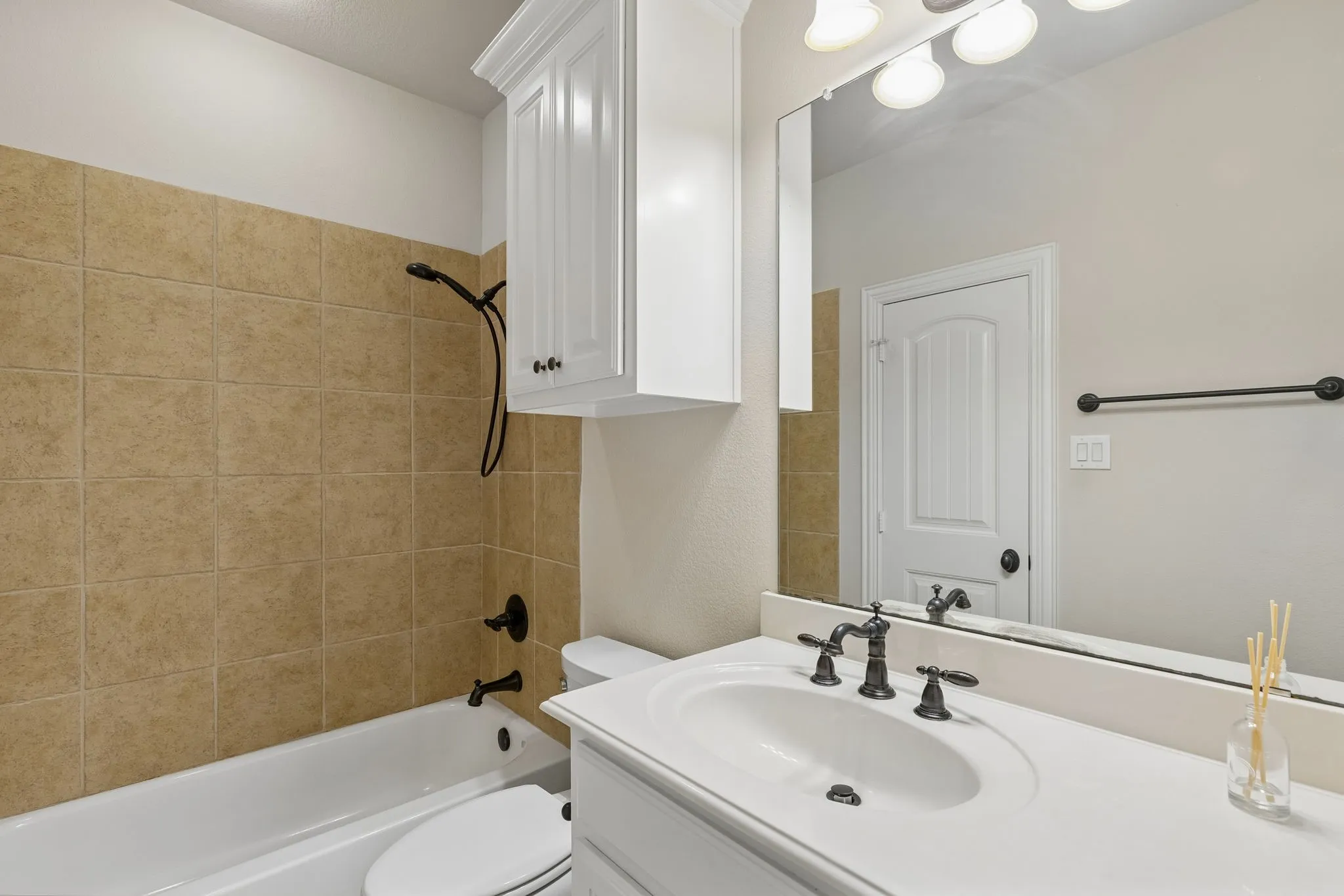 One of 2 identical upstairs bathrooms.