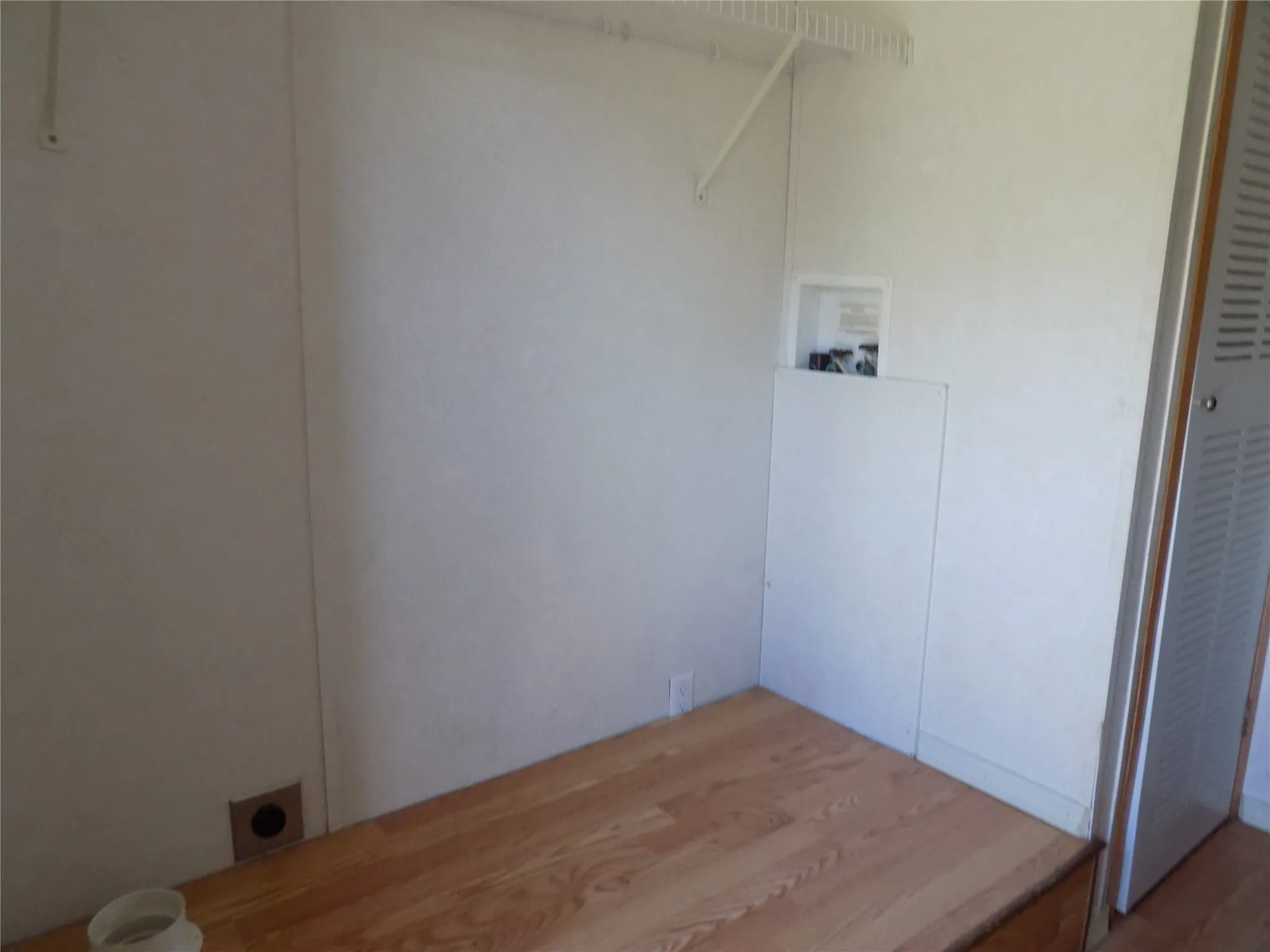 Roomy 10' x 6' laundry room.