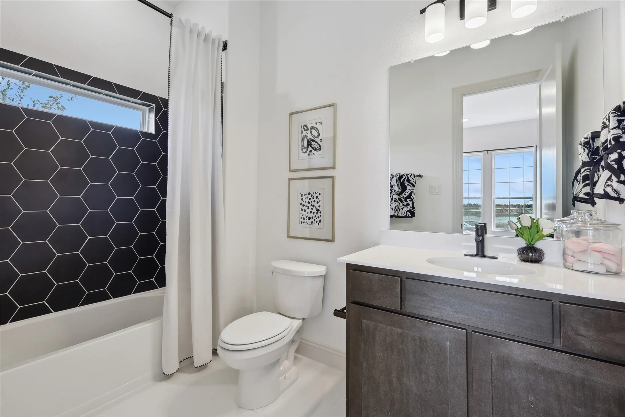 Model home photos of similar floorplans, not pictures of actual home.
