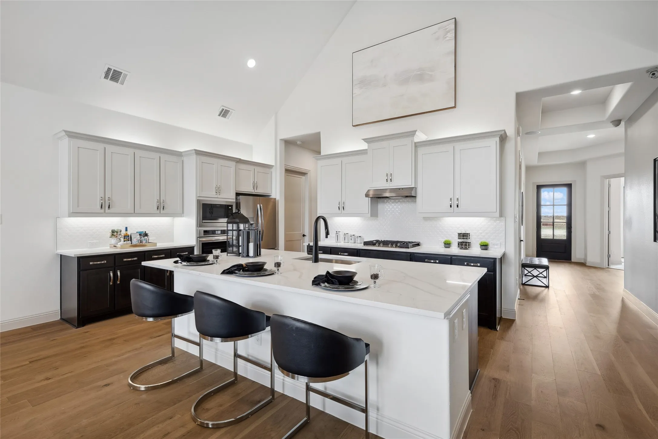 Model home photos of similar floorplans, not pictures of actual home.