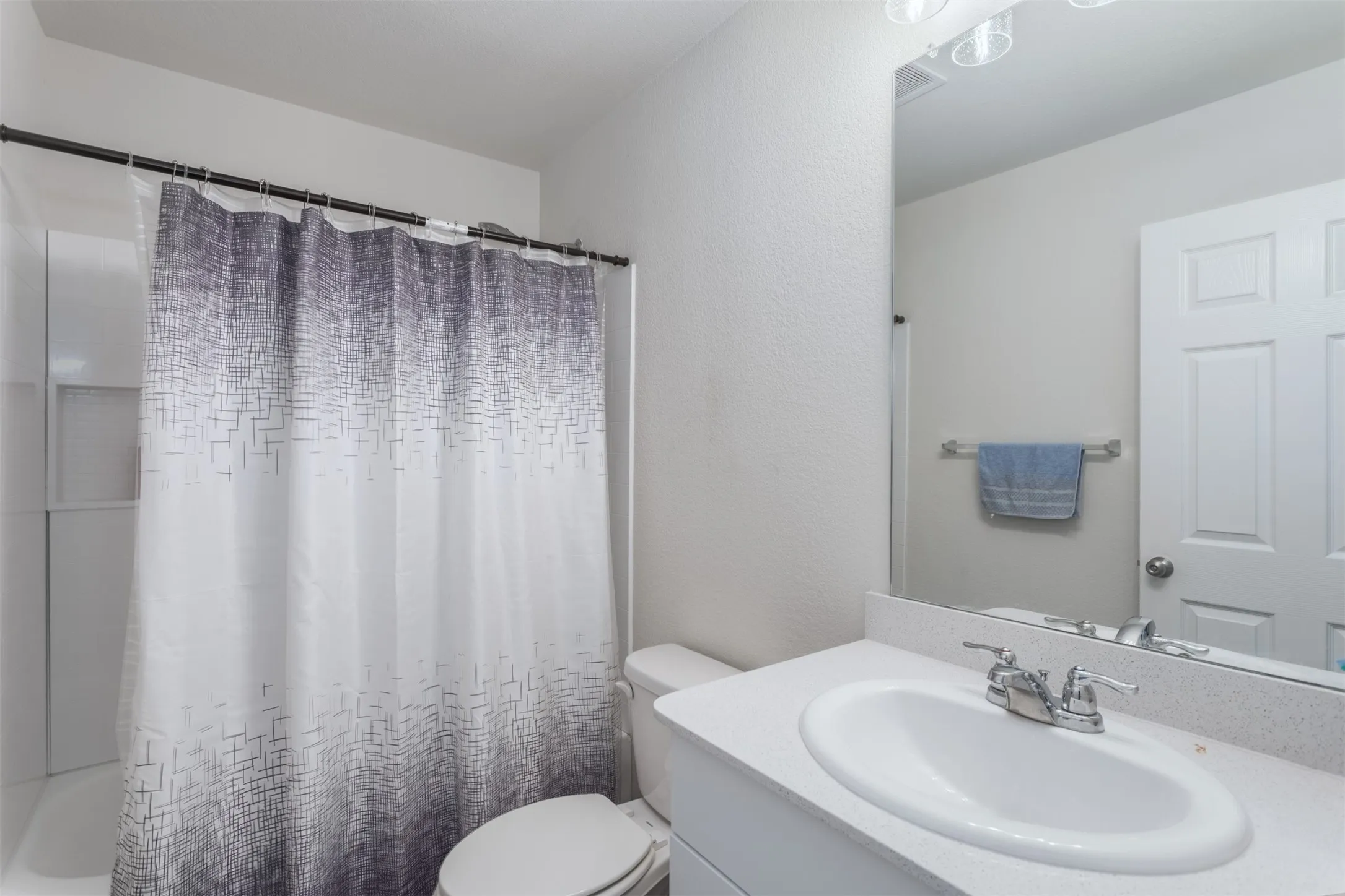Full bath downstairs creates flexibilty for the downstairs flex room.