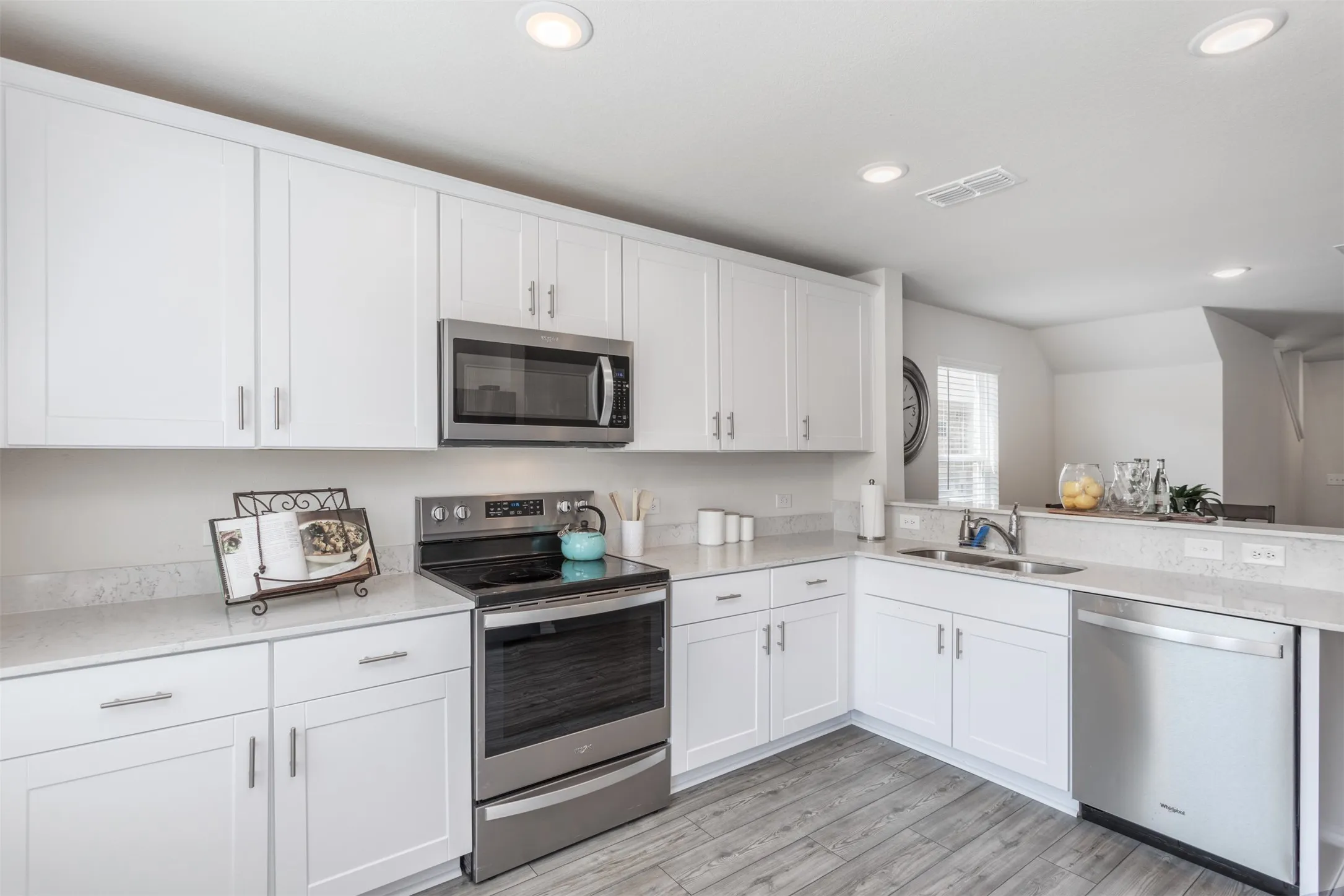 With ample prep space and SS appliances, this kitchen will please the gourmet cook in you.