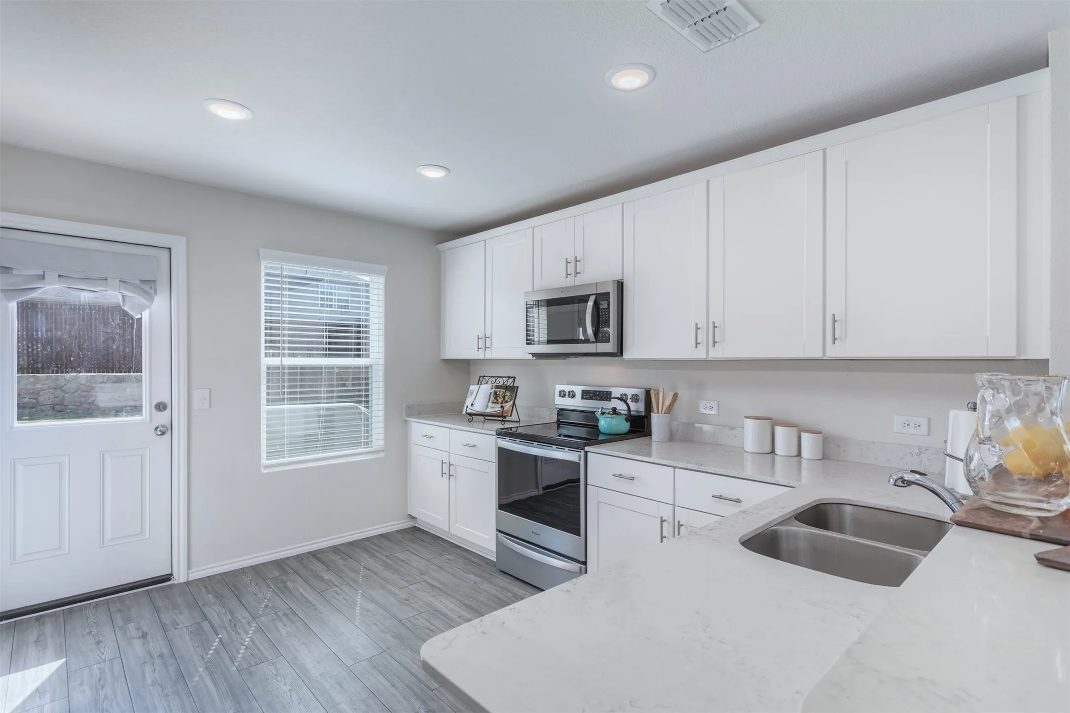 Popcorn , soda, coffee anyone?  This kitchen has a place for everything.