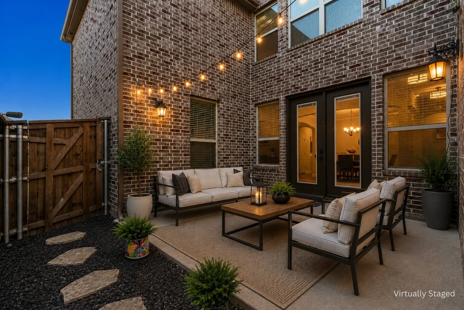 Inviting side patio offering a peaceful outdoor retreat *Virtually staged