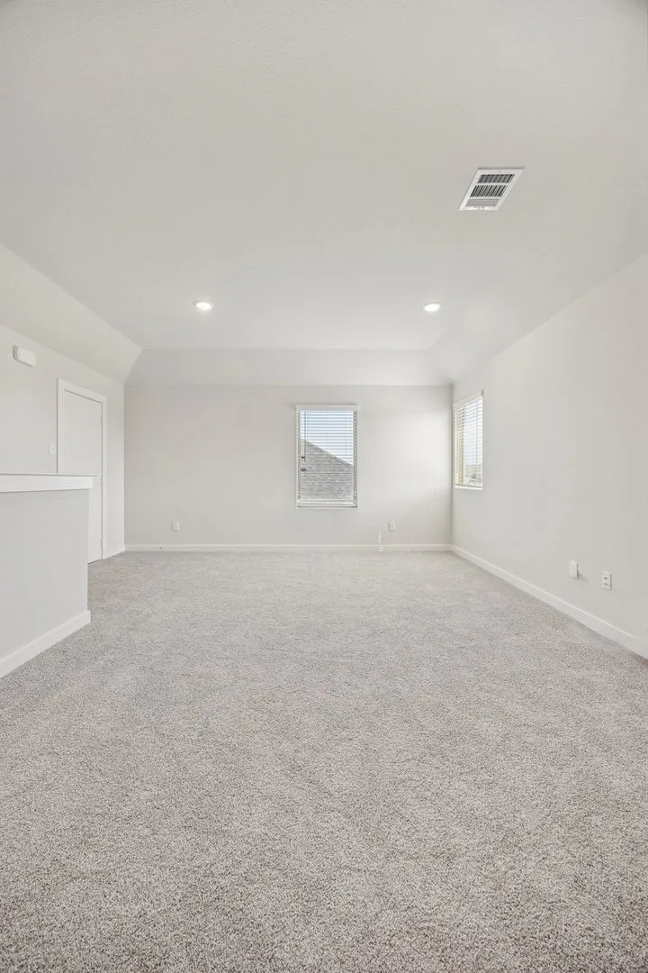 Game Room in the Stanley II home plan by Trophy Signature Homes – REPRESENTATIVE PHOTO