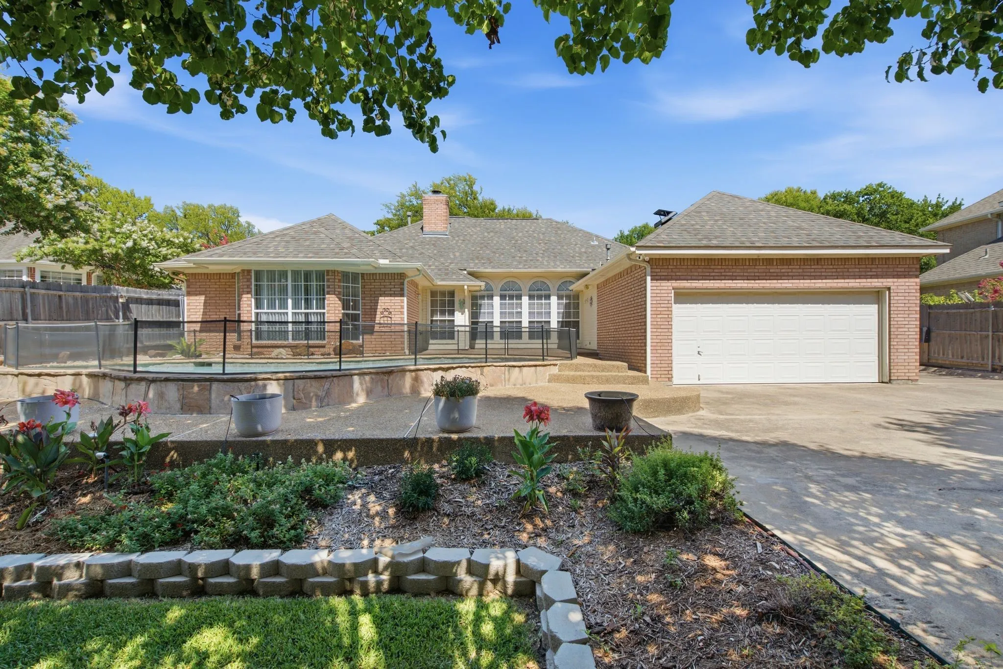 Brick exterior with a two-car garage