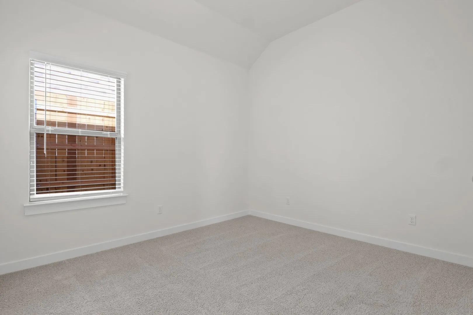 Bedroom in the Pecan II home plan by Trophy Signature Homes – REPRESENTATIVE PHOTO